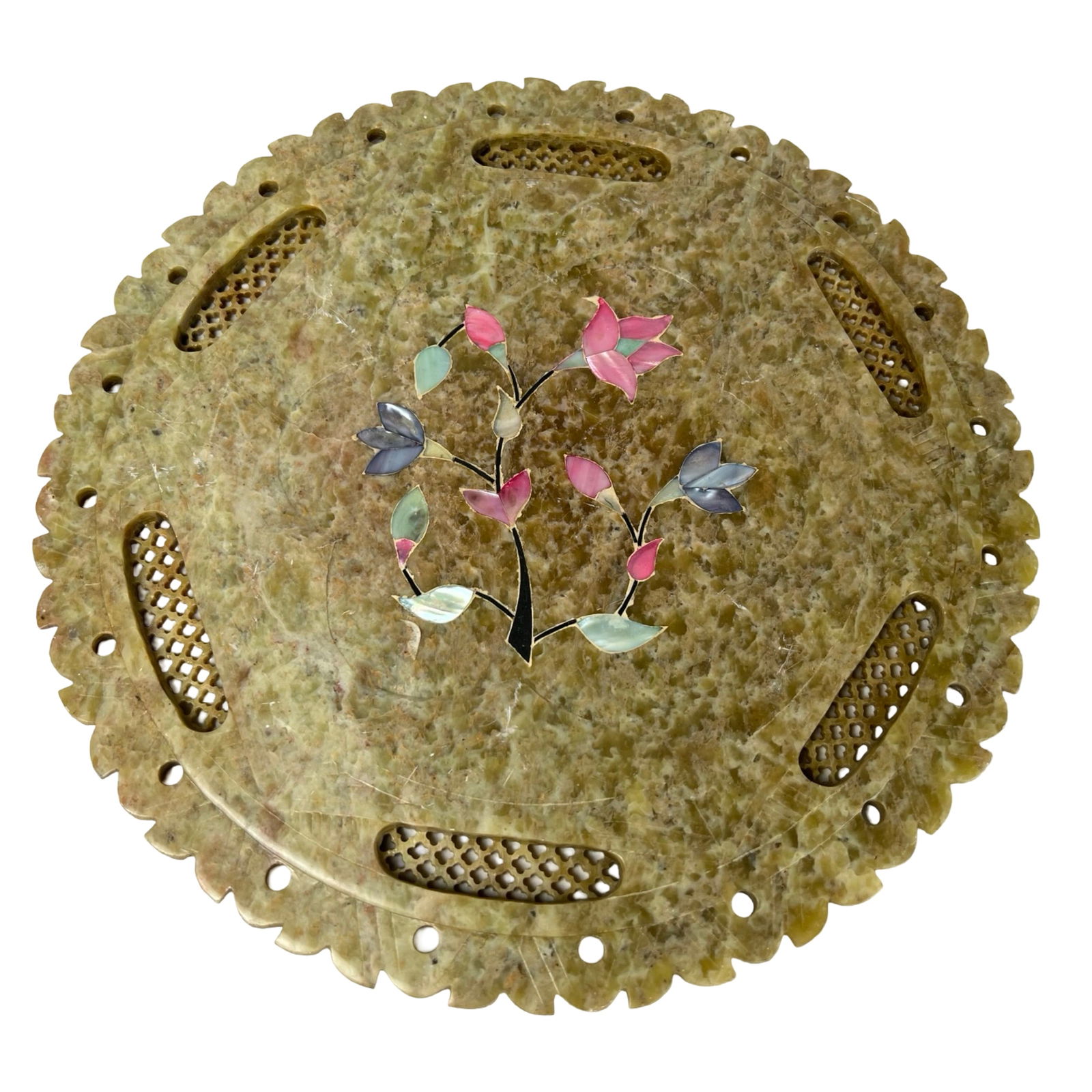Carved Chinese Soapstone Pierced Plate Gemstone In: Intricately hand-carved circular soapstone plate featuring a delicate floral design inlaid with semi-precious gemstones in hues of pink, green, and blue. The plate displays finely pierced latticework