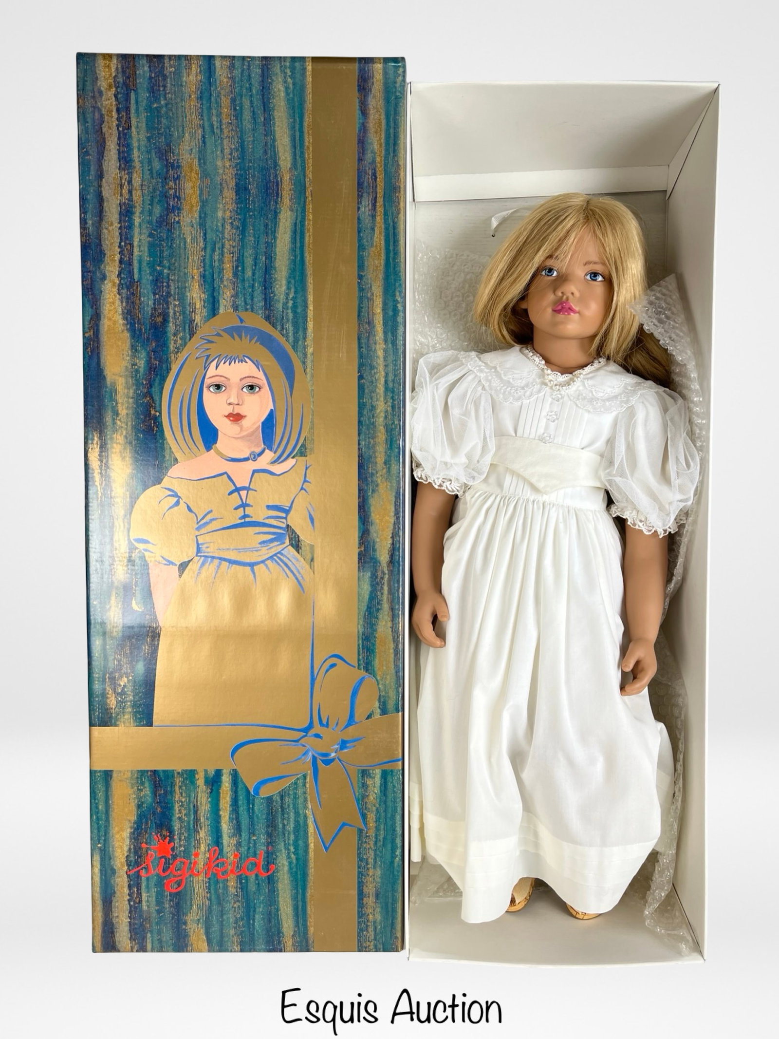 Sigikid Artist Doll "Uschi Eder" by J. Nippler- LE: Charming and expressive limited edition Sigikid artist doll titled "Uschi Eder," sculpted by J. Nippler and designed by M. Eder. This 25" tall doll features a soft vinyl head and limbs, hand-painted e