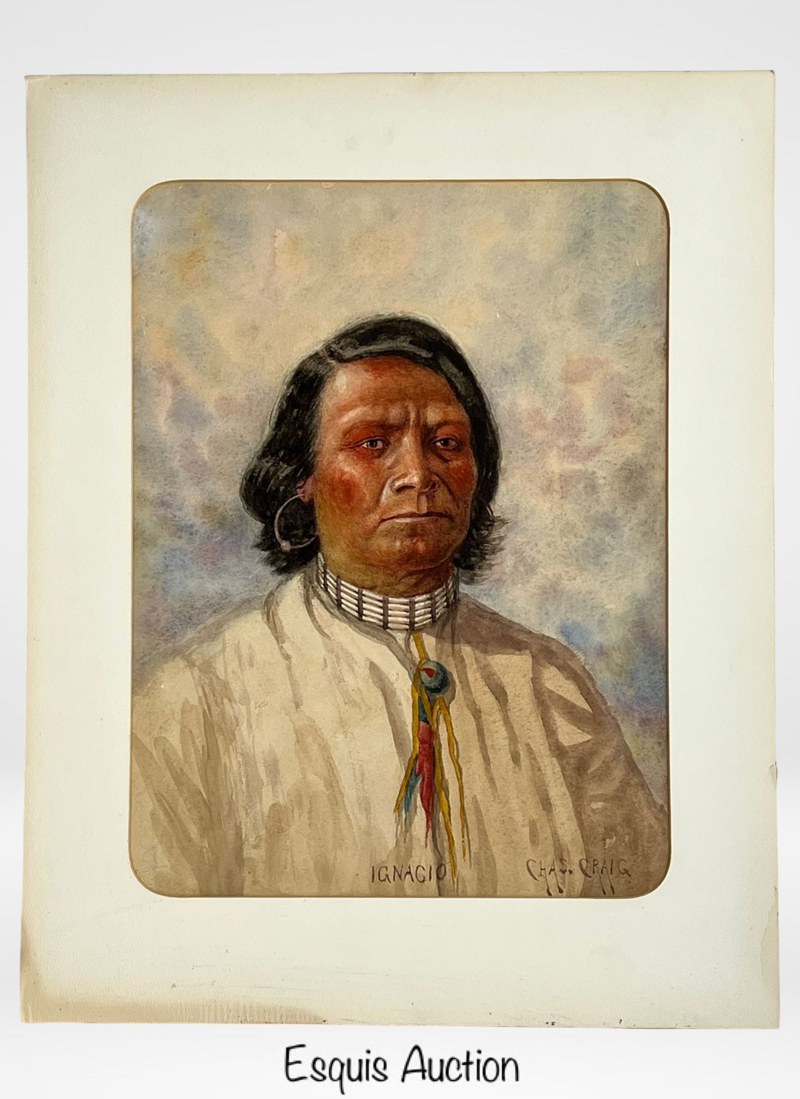 Charles Craig - Portrait of a Native American Man: Striking watercolor portrait by Charles Craig, titled "Ignacio", depicting a Native American man in traditional attire. The subject is rendered with powerful realism, wearing a white garment, bone cho