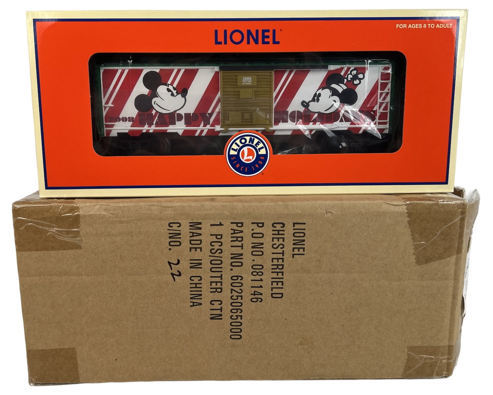 Lionel Disney Limited Edition RR Christmas Boxcar: Lionel 6-25065 Disney Christmas boxcar featuring classic Mickey and Minnie graphics with red-and-white candy cane stripes. Marked "2008 Happy Holidays." Car includes opening doors and comes in its ori