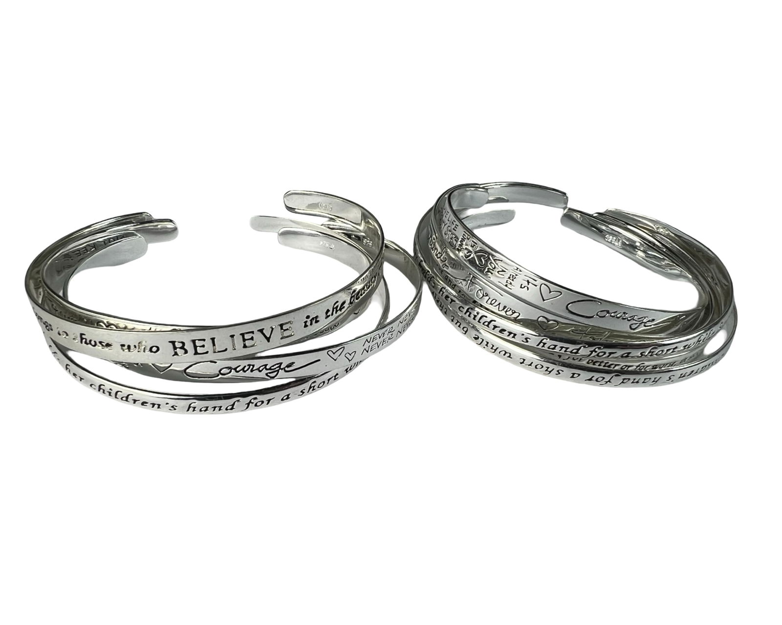 Sterling Silver Friendship & Love Bracelets: Collection of ten sterling silver cuff bracelets, each engraved with heartfelt sayings and inspirational messages. Phrases include sentiments of friendship, sisterhood, love, courage, and family bonds