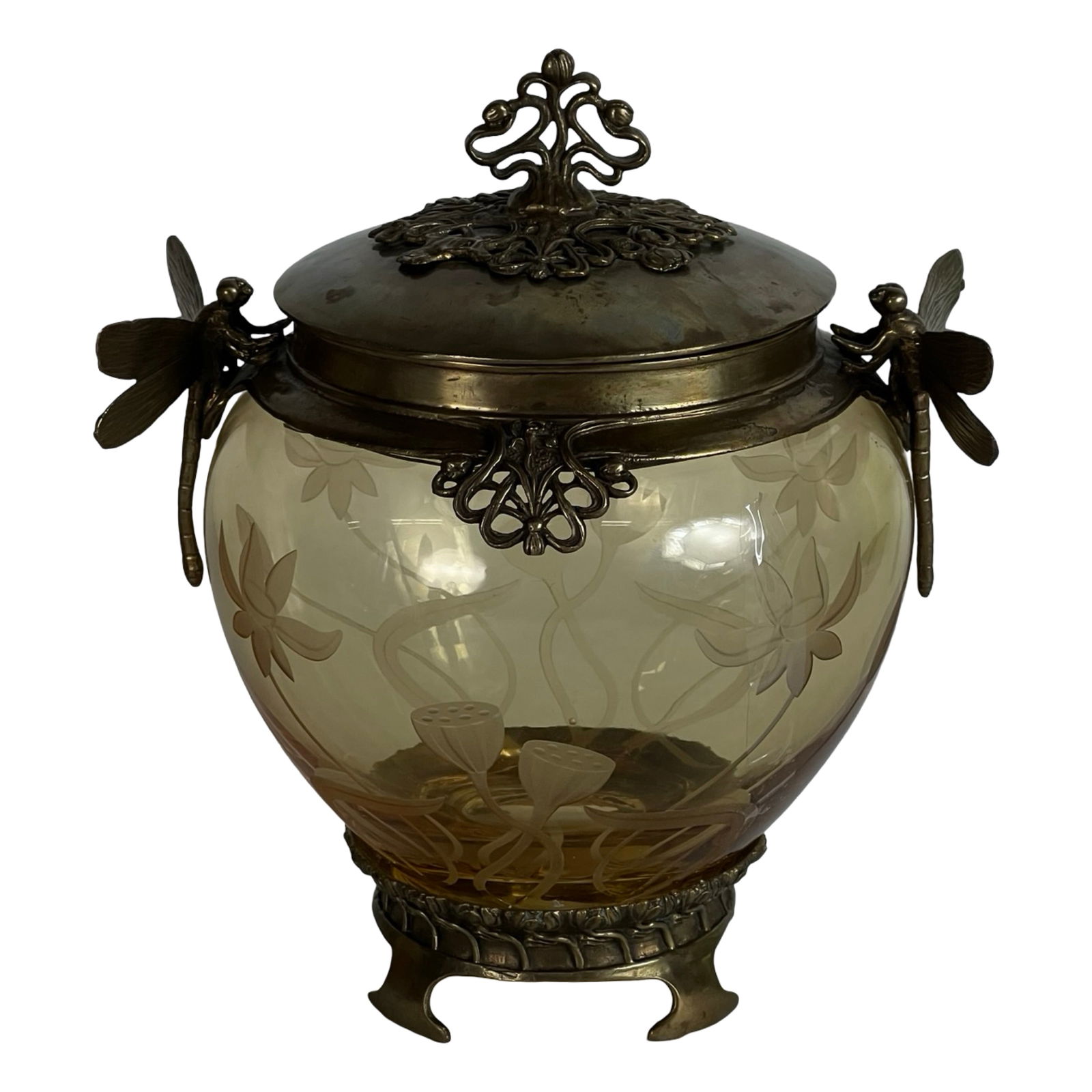 Castilian Art Nouveau Dragonfly Glass Biscuit Jar: Elegant Art Nouveau-style biscuit jar by Castilian, featuring richly detailed dragonfly handles and lid finial in antique brass-tone metal. The amber-toned glass body is beautifully acid-etched with l