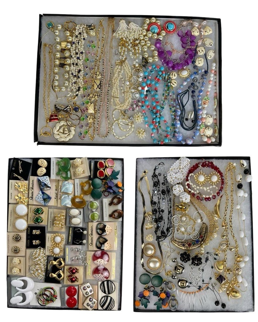Assortment of Costume Jewelry - Sparkling Variety: Elevate your style with this dazzling Assortment of Costume Jewelry. Bursting with variety, this collection features an array of necklaces, earrings, bracelets, and more, each piece designed to add a 