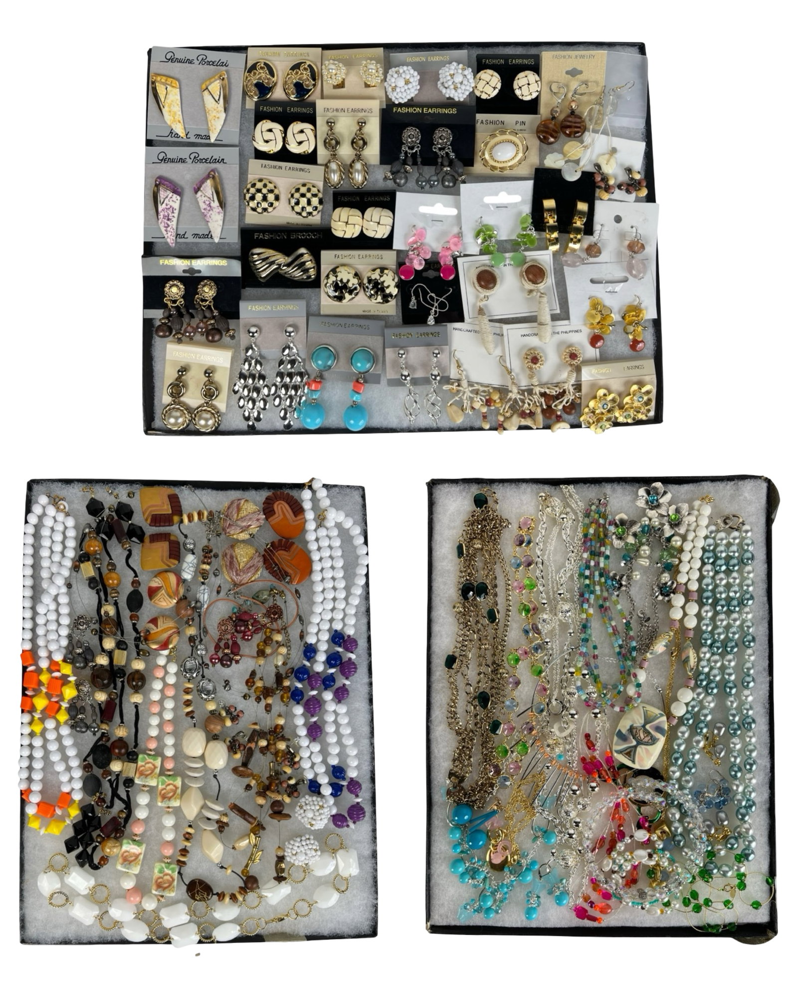 Assortment of Costume Jewelry - Sparkling Variety: Elevate your style with this dazzling Assortment of Costume Jewelry. Bursting with variety, this collection features an array of necklaces, earrings, bracelets, and more, each piece designed to add a 