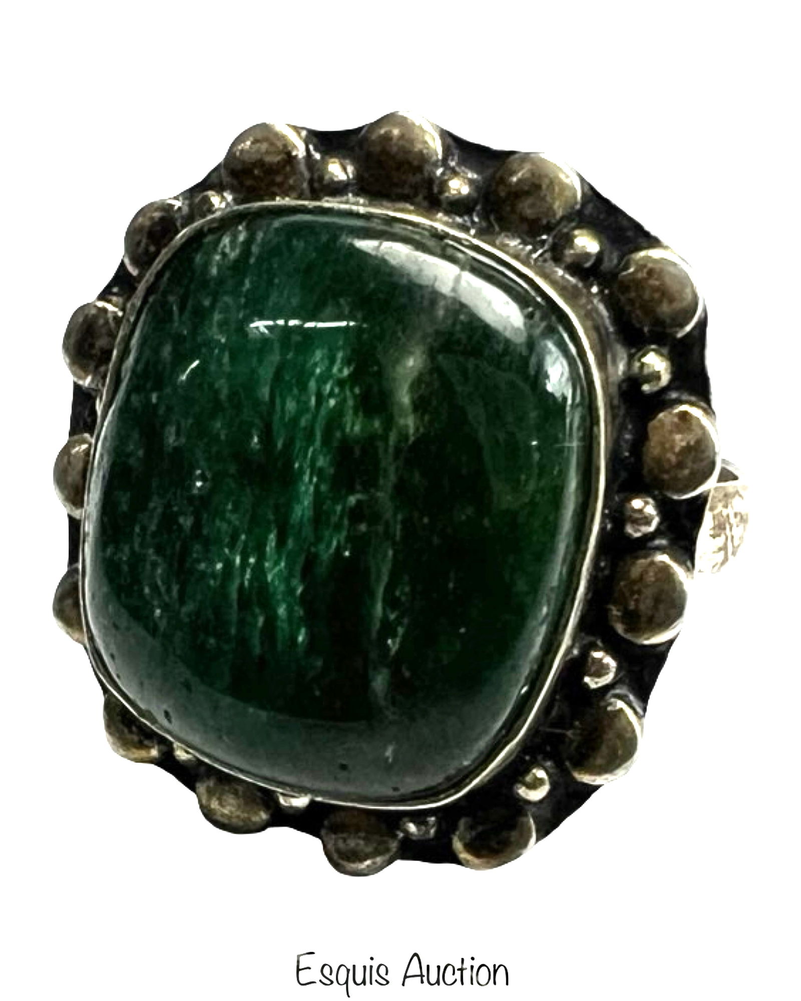 Sterling Silver & Malachite Ring: A bold sterling silver ring showcasing a deep green malachite cabochon with natural banding and depth. The stone is framed by a decorative beaded silver border, adding texture and vintage character. R