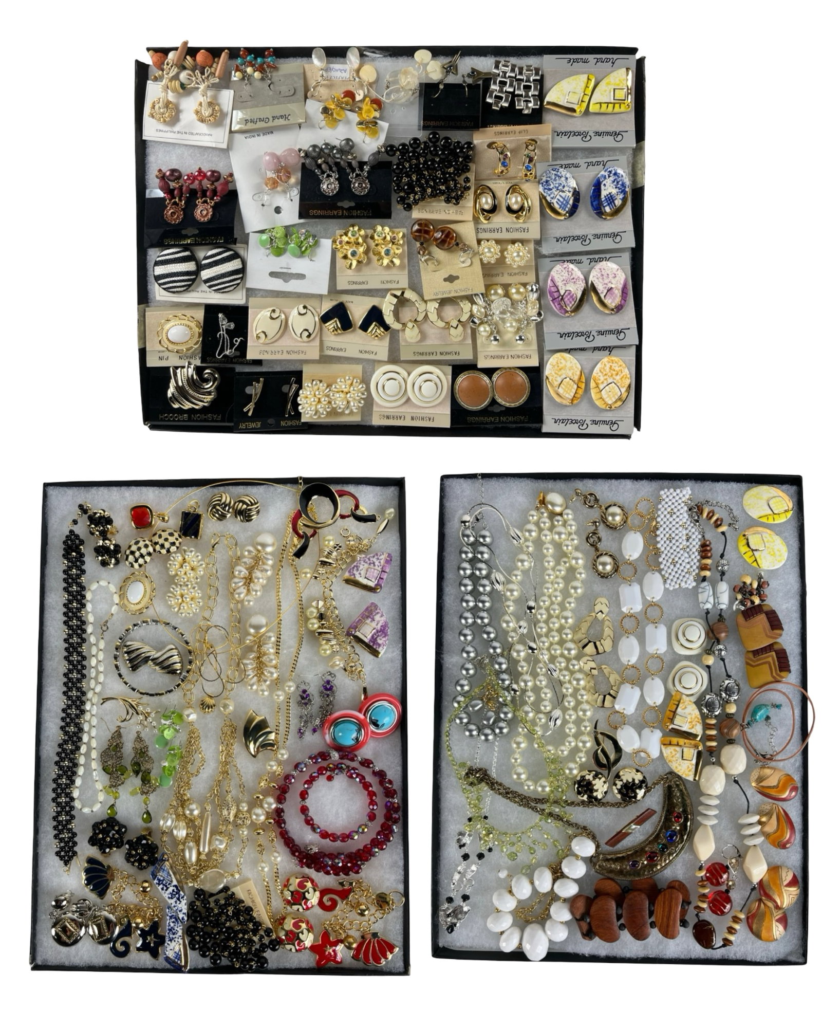 Assortment of Costume Jewelry - Sparkling Variety: Elevate your style with this dazzling Assortment of Costume Jewelry. Bursting with variety, this collection features an array of necklaces, earrings, bracelets, and more, each piece designed to add a 