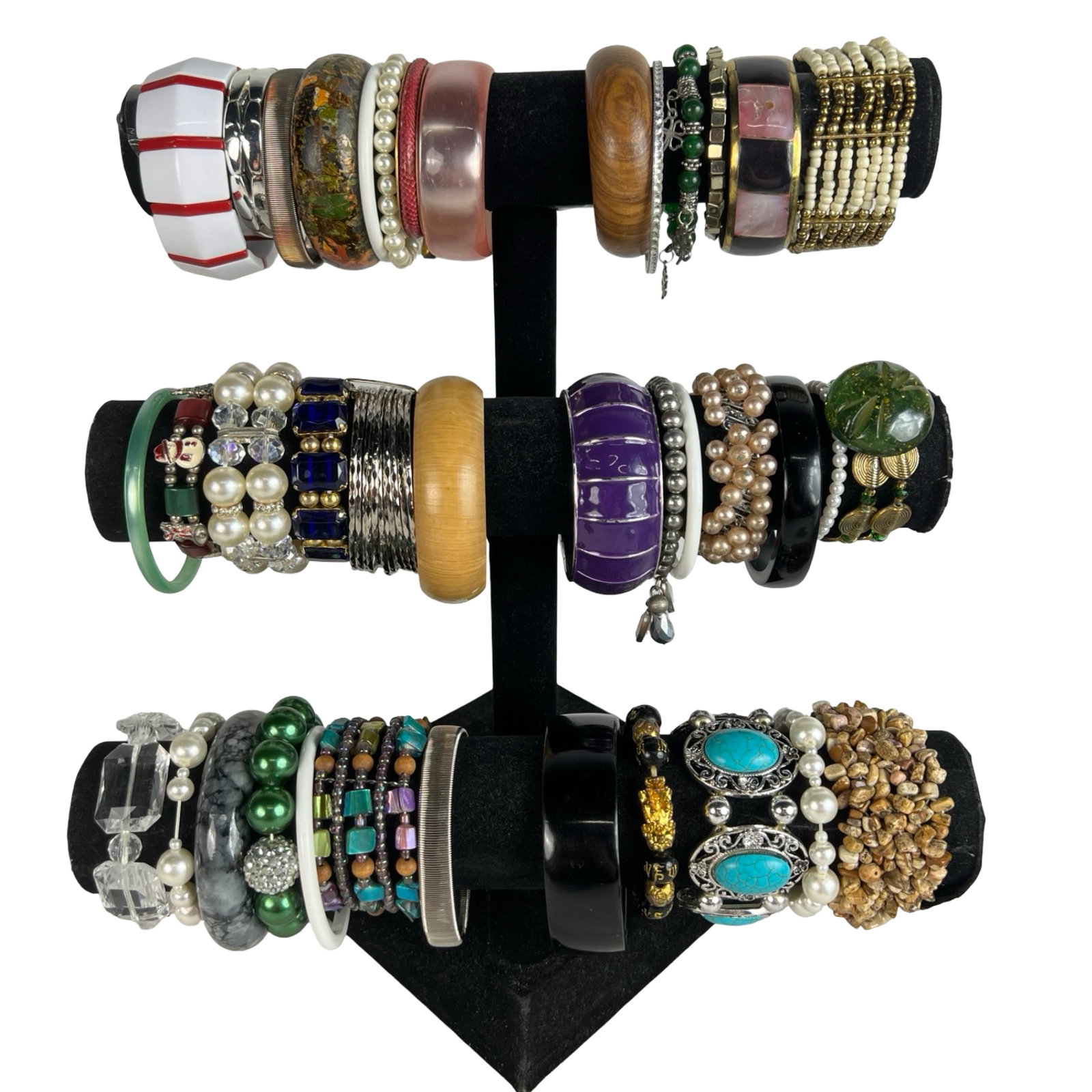 Collection of Lady's Bracelets: Explore a diverse assortment of bracelets, each one offering its own unique style and charm. Display stands are not included.