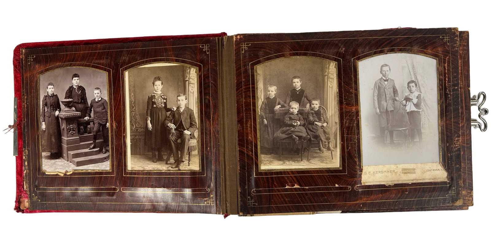 Antique Victorian Photo Album With 19th C Photos: Stunning antique Victorian-era photo album featuring a padded red velvet cover with inset beveled mirror and original working silver-tone metal clasp.The album houses a wide variety of formal 19th-cen