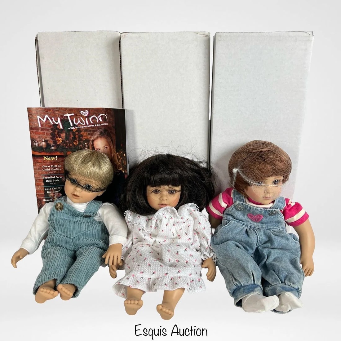 My Twinn Dolls- Cuddly Micah, Rachel & Tiffany: Set of three My Twinn dolls, each measuring approximately 14 inches tall. The group includes Cuddly Brother Micah in aqua overalls, Cuddly Rachel in a printed nightgown, and Cuddly Tiffany in denim ov