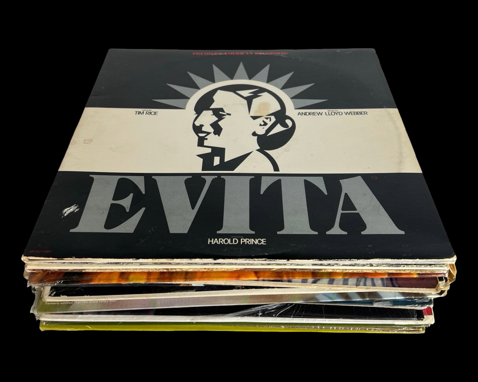 Vintage Vinyl Record Collection: This eclectic vinyl LP lot features a rich mix of Broadway cast recordings, classic vocalists, soundtracks, and easy listening favorites. Notable titles include Evita by Tim Rice and Andrew Lloyd Webb
