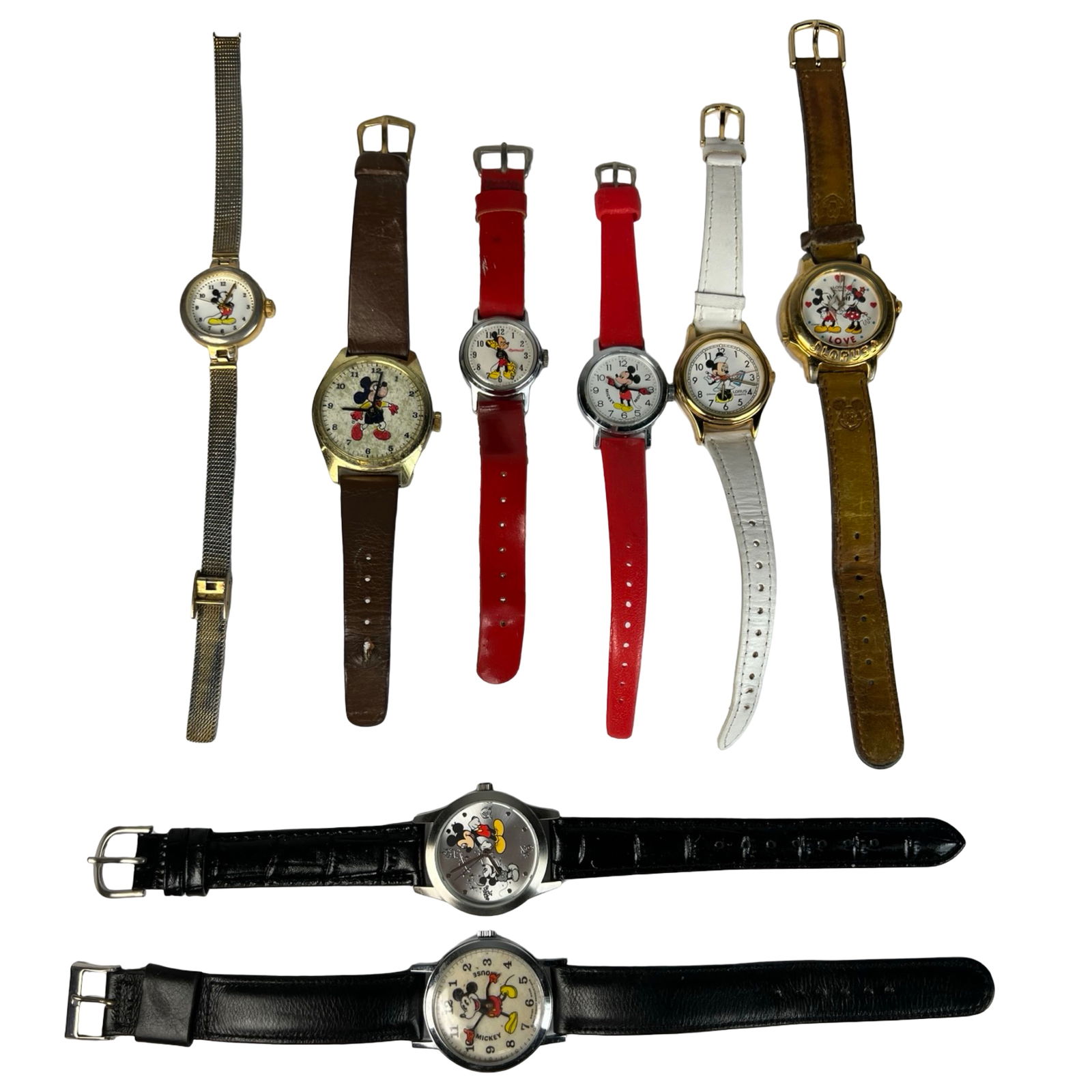 Group of Vintage Disney Mickey Mouse Wristwatches: Charming collection of vintage Mickey Mouse wristwatches featuring various classic designs and dials, including early Bradley Swiss Made examples and Lorus Quartz editions. The lot includes different