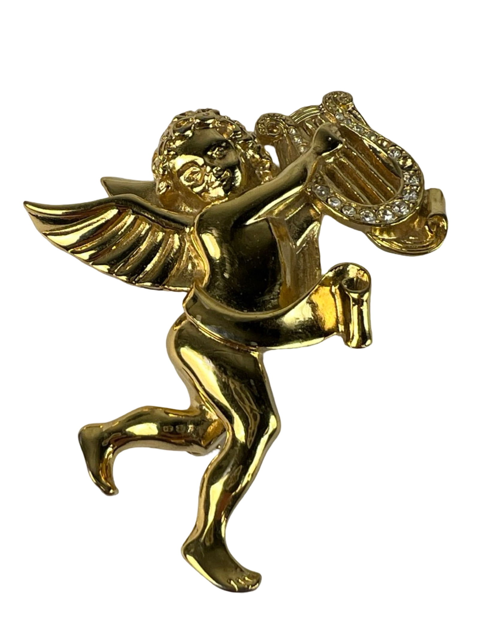 Givenchy zLarge Designer Cherub Brooch: Striking vintage designer brooch depicting a winged cherub in polished gold-tone metal, joyfully playing a lyre embellished with sparkling clear rhinestones. Marked on the reverse with the Givenchy Ne