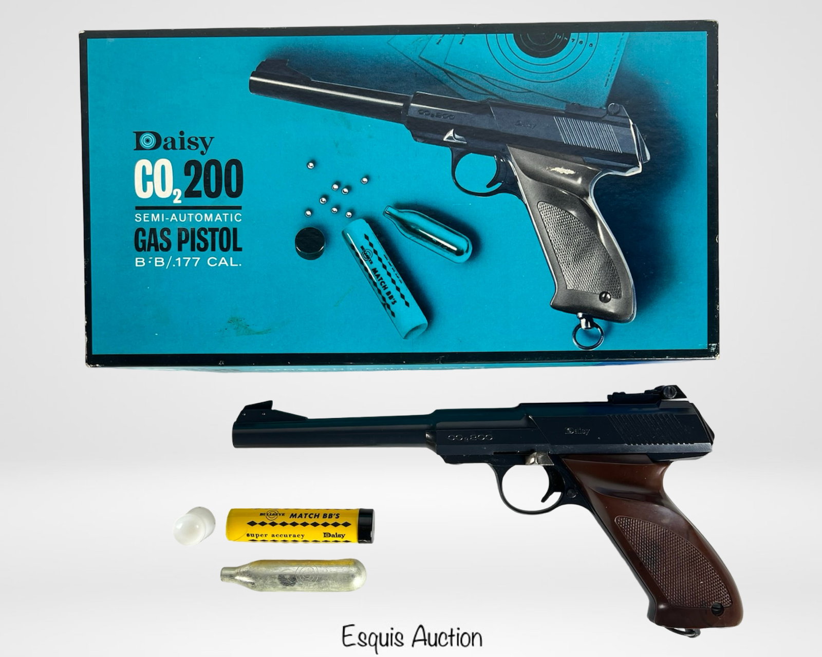 Vintage Daisy CO2 200 Semi-Automatic Air Pistol: Vintage Daisy CO2 200 semi-automatic air pistol chambered for .177 caliber BBs. Features sleek brown polymer grip panels and a metal frame with original "Daisy MFG CO. Rogers, ARK., U.S.A." markings. 