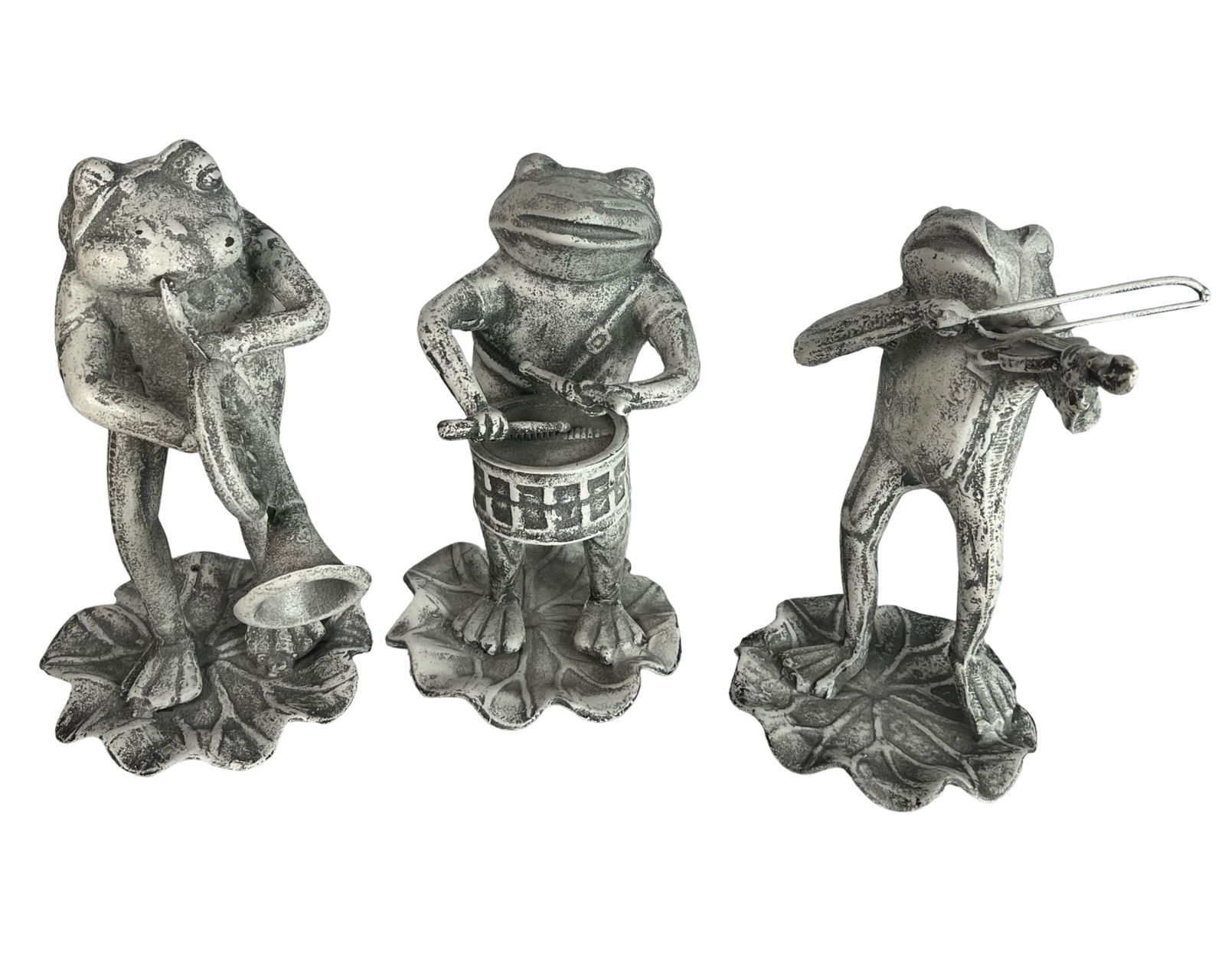 Set of 3 Metal Frog Musician Garden Sculptures: Whimsical trio of metal frog musician sculptures, each standing on a textured lily pad base. The set includes a frog playing a trumpet, one on drums, and another with a violin, all finished in a distr