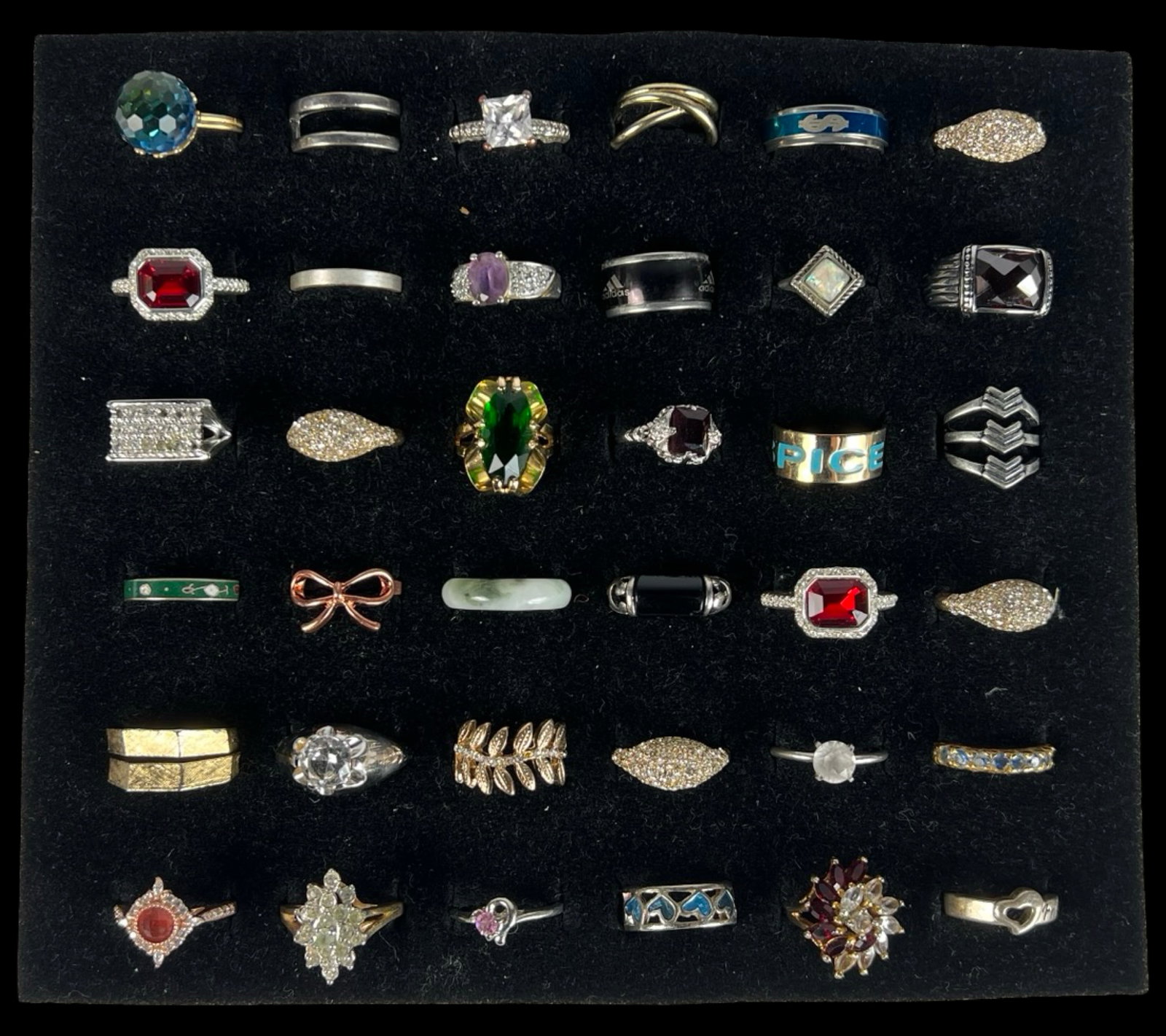 Exquisite Collection: Set of 36 Various Rings: Embark on a journey through diverse styles and eras with this stunning collection of 36 rings, each possessing its own unique charm and character. From timeless classics to contemporary statement piec