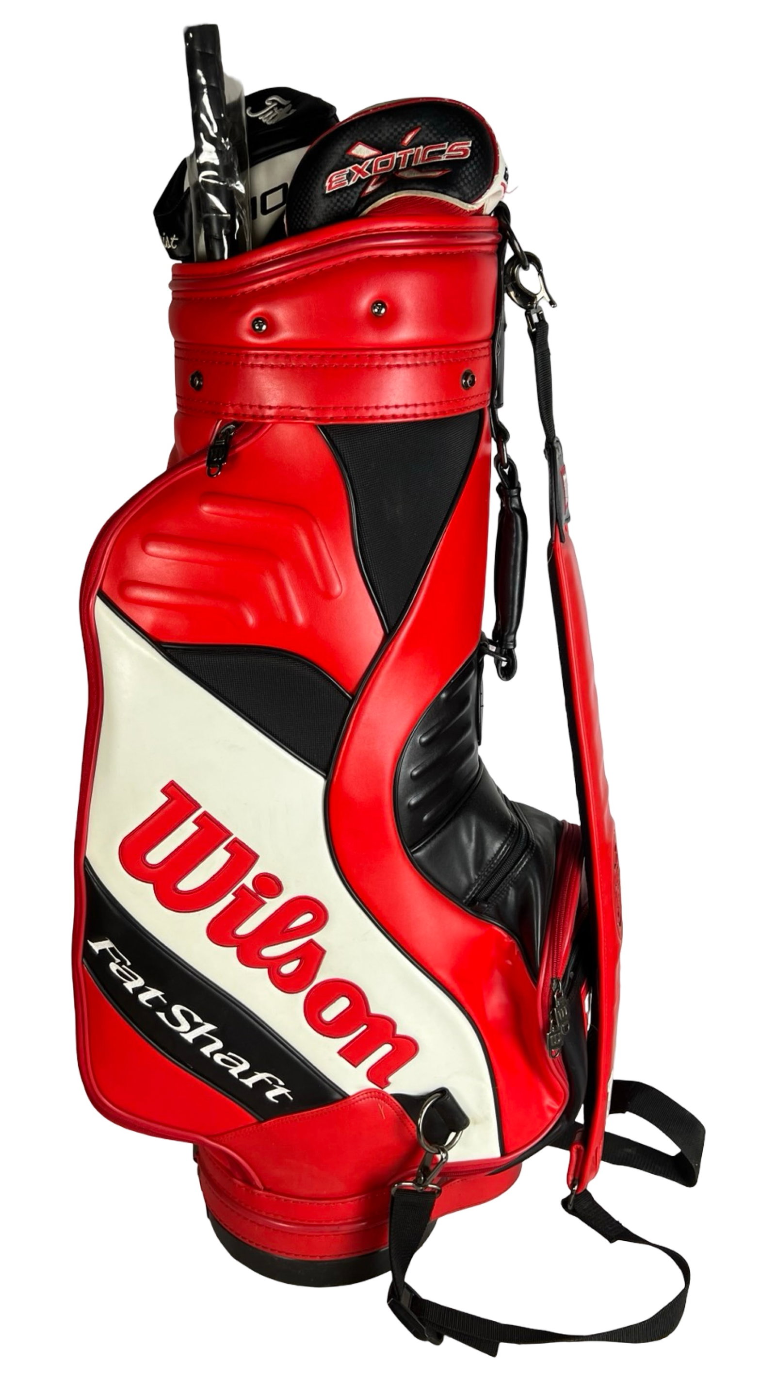 Wilson Fat Shaft Golf Bag with Headcovers: Boldly styled in red, black, and white, this Wilson Fat Shaft golf bag offers a dynamic and functional carry solution for your clubs. Designed with padded shoulder straps and multiple zippered compart