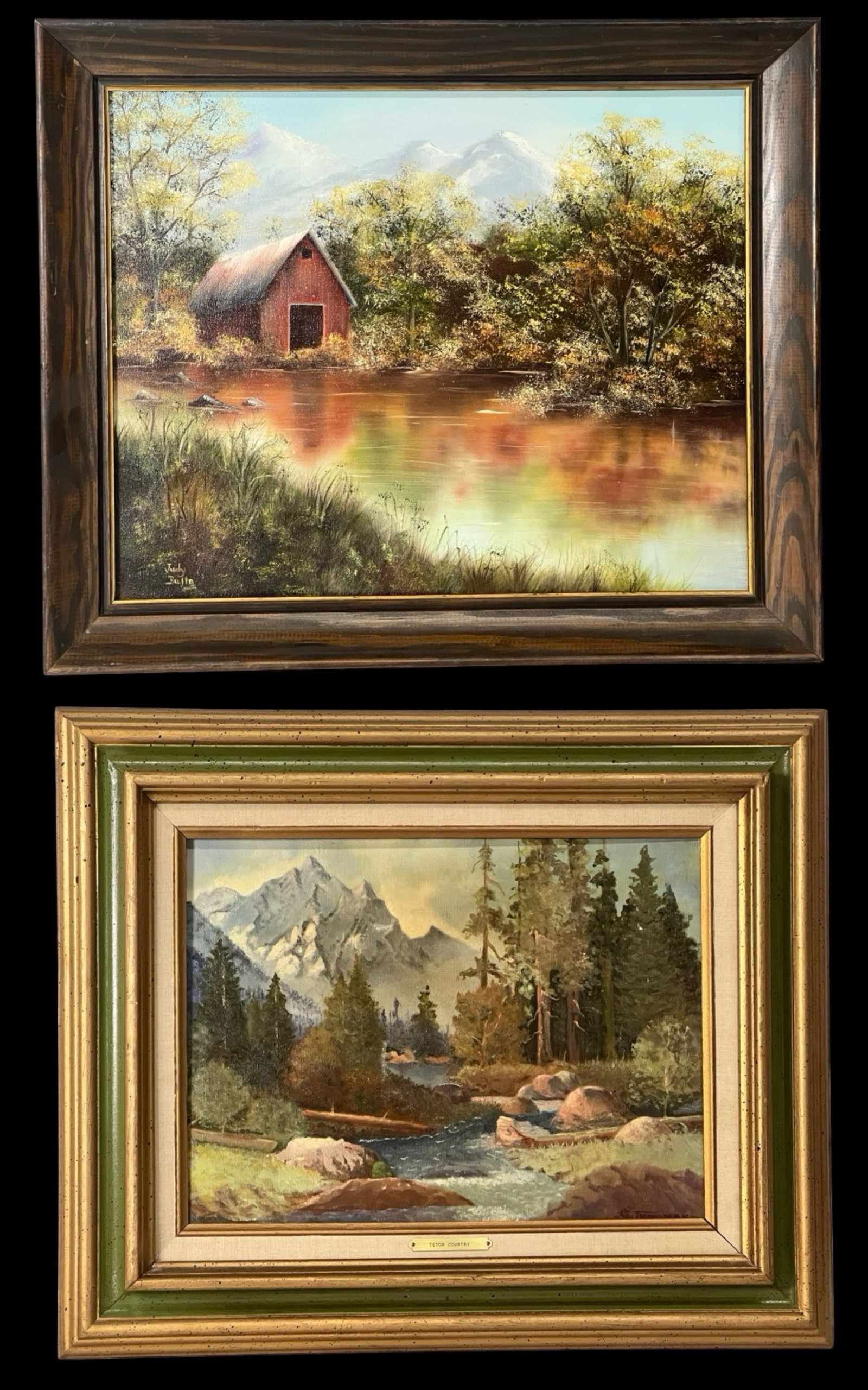 Lot of Two Vintage Landscape Oil Paintings: Charming pair of vintage landscape oil paintings, both executed in a traditional realism style and presented in handsome wood frames. The first piece, signed by Judy Butts, features a peaceful lakesid