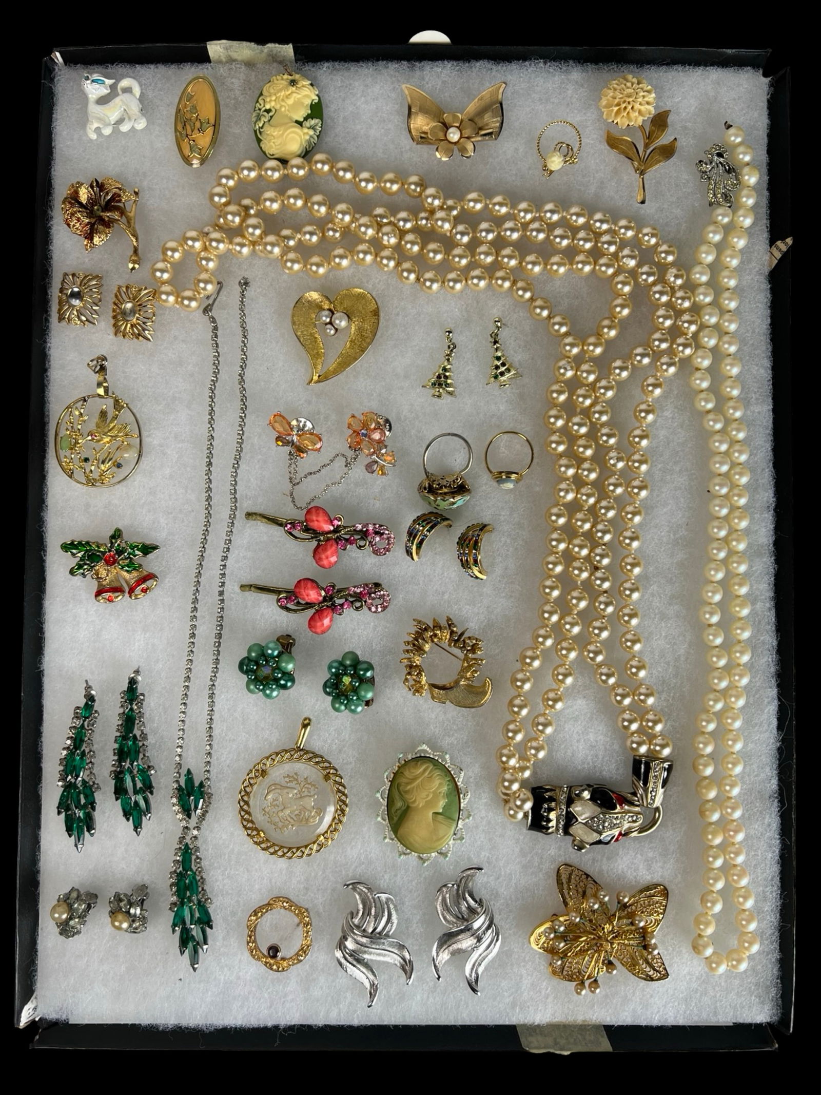 Vintage Costume Jewelry - Trifari, Vendome & Wells: Charming and diverse vintage costume jewelry collection showcasing well-known makers and elegant designs. Highlights include a Vendome rhinestone brooch, a Crown Trifari zodiac pendant and multiple pa