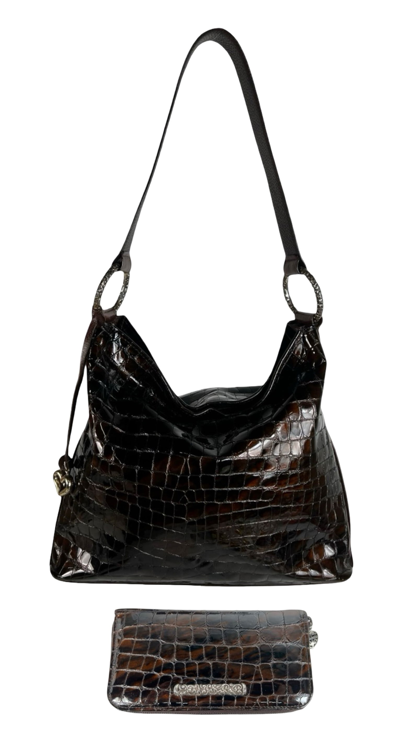 Brighton "Cher Cherie" Croc-Embossed Shoulder Bag: embossed patent leather exterior, accented with textured ring hardware and signature heart charm. The wide leather strap offers comfortable wear, and the satin interior is fully lined with Brighton's