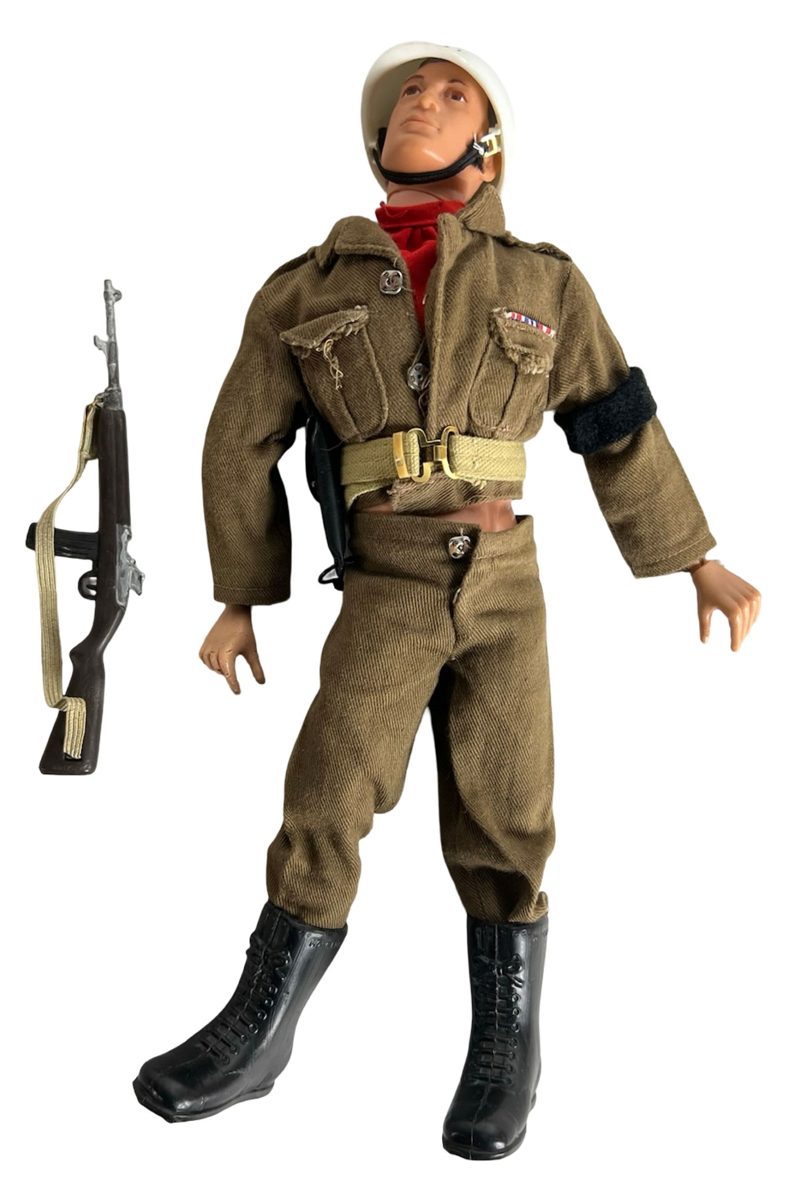 1960s G.I. Joe Military Police Action Figure: 1960s G.I. Joe Military Police action figure dressed in authentic brown military police uniform with black armband, red scarf, white MP helmet, and combat boots. The figure includes a sidearm in belt