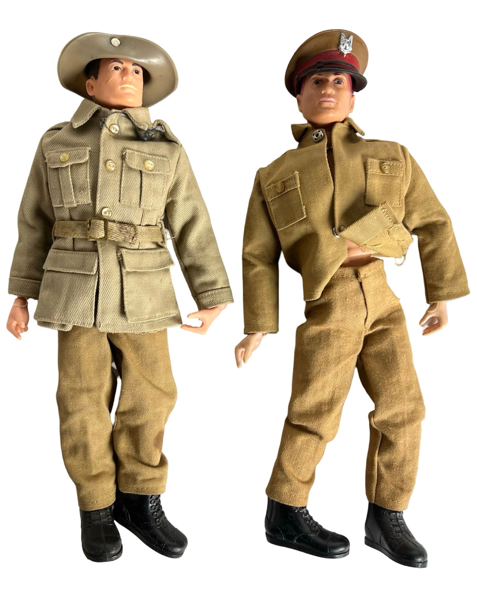 2 G.I. Joe Action Figures in Military Uniforms: Pair of vintage-style 12-inch G.I. Joe action figures dressed in tan and khaki military uniforms. One figure wears a long tunic with belt, slouch hat, and black boots, resembling a Commonwealth or des