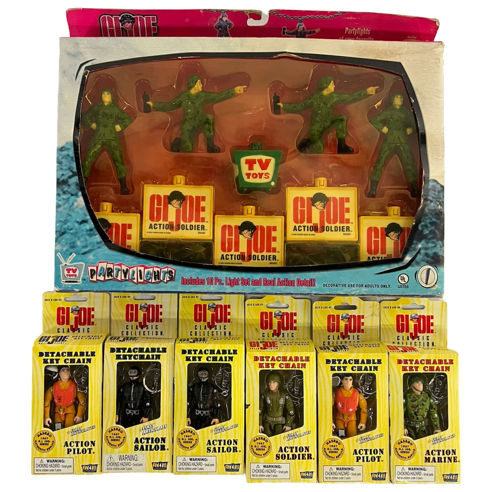 GI Joe Partylights Set & Action Figures Key Chains: Vintage G.I. Joe Partylights string light set with ten pieces showing Action Soldier figures and TV Toys logos. Box displays light shelf wear but remains complete with graphics visible front and back.
