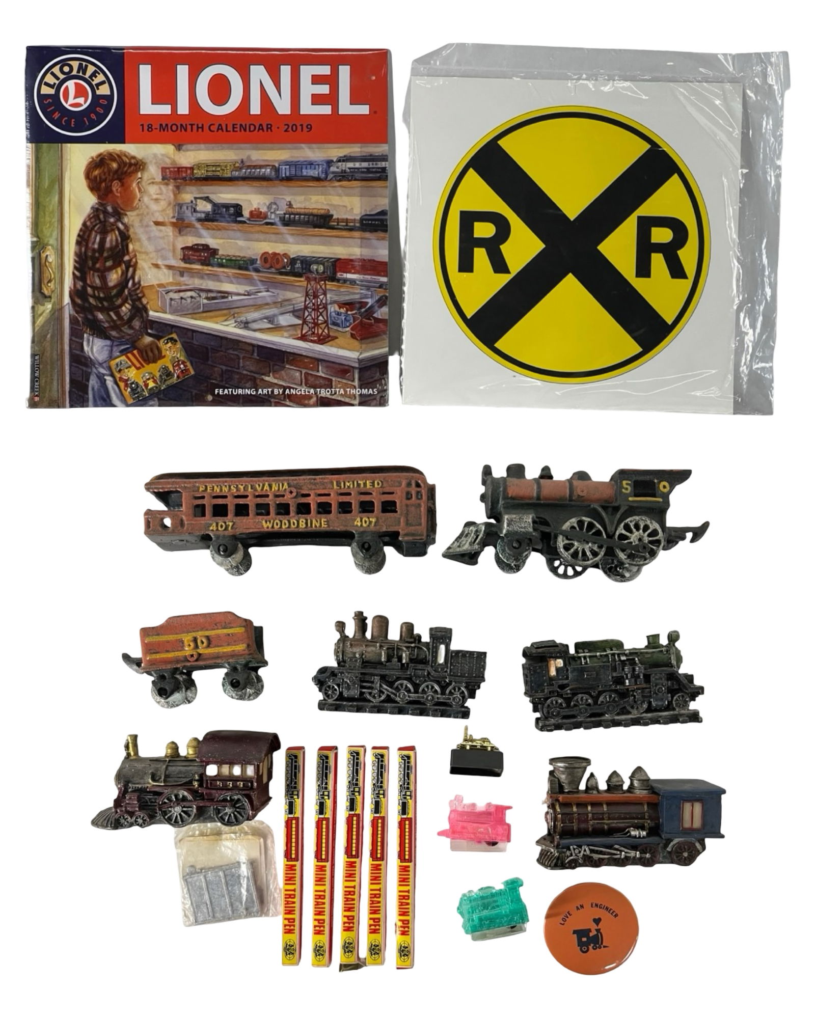 Cast Iron Locomotives & Railroad Collectibles Lot: Railroad-themed collector's lot featuring one cast iron steam locomotive with matching tender and a cast iron trolley car. Includes several composite material train bookends in the form of detailed vi