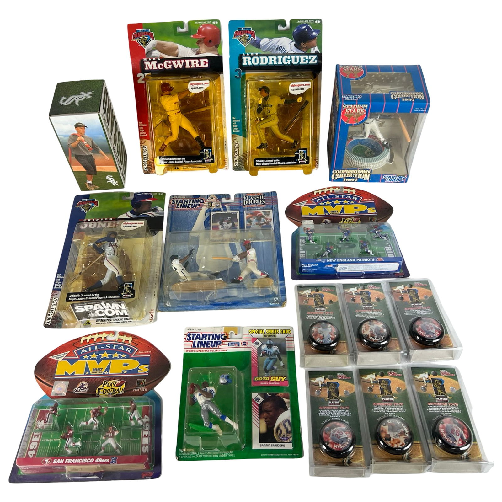 Large Lot of Sports Action Figures & Collectibles: Mixed assortment of vintage sports collectibles, including sealed Starting Lineup and McFarlane action figures, All-Star MVPs football figure sets, Stadium Stars Cooperstown Collection model, Supersta