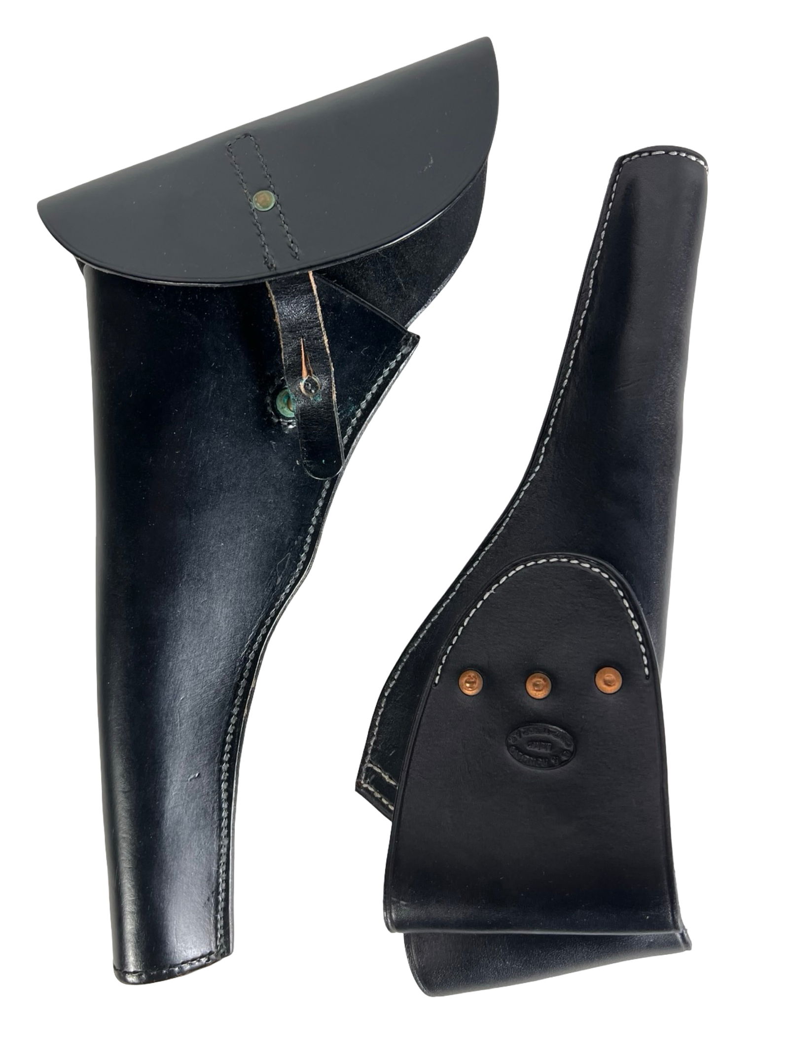 US Military Style Leather Revolver Holsters: Pair of vintage black leather revolver holsters, each made by respected American leather craftsmen. One holster is stamped C.F. Rowland - Maker - Camp Verde, AZ, representing a small Arizona shop know