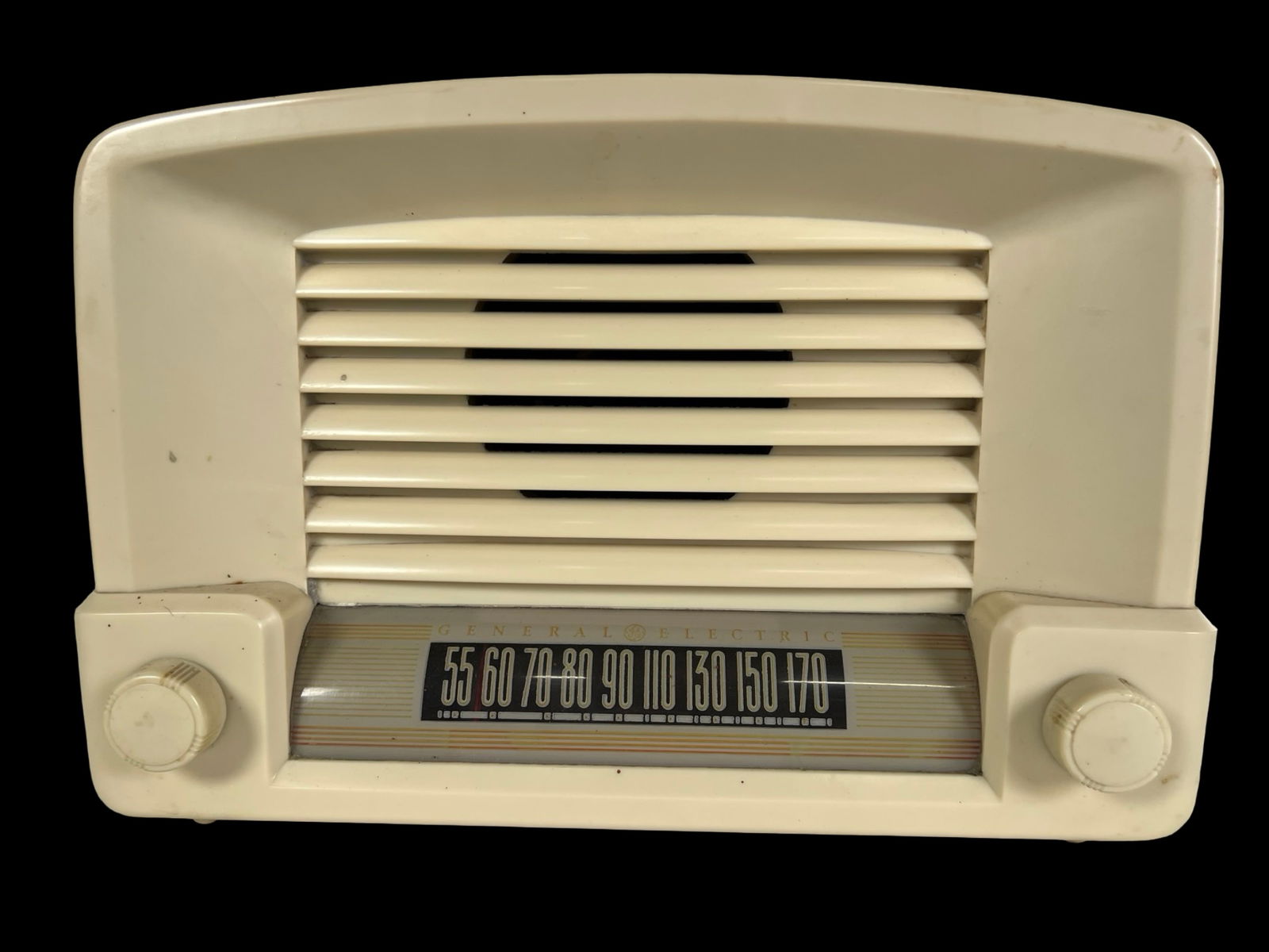 General Electric Model 114W AM Vacuum Tube Radio: Vintage General Electric (GE) Model 114W AM vacuum tube radio from the 1940s, featuring a classic ivory Bakelite cabinet with horizontal grille design and dual control knobs.. Measures approximately 1