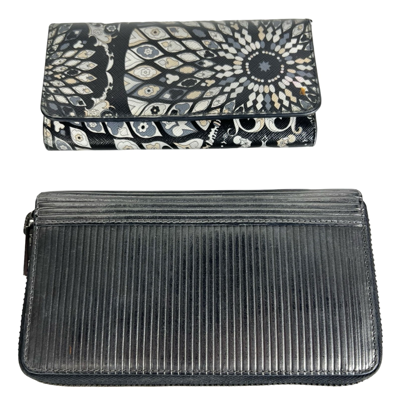 Emilio Pucci Designer Lady's Wallet & Black Leath: Emilio Pucci designer lady's wallet featuring the signature patterned exterior and multiple interior card slots, made in Italy. Includes an additional high-quality black leather lady's wallet with zip