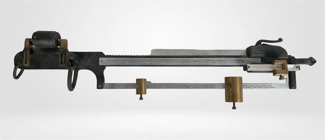 Antique Industrial Hanging Sliding Scale by Webb: Impressive and substantial early 20th-century industrial hanging sliding scale, manufactured by The Webb Company of Webb City, Missouri. Measuring 50 inches in length, this heavy-duty steel and brass
