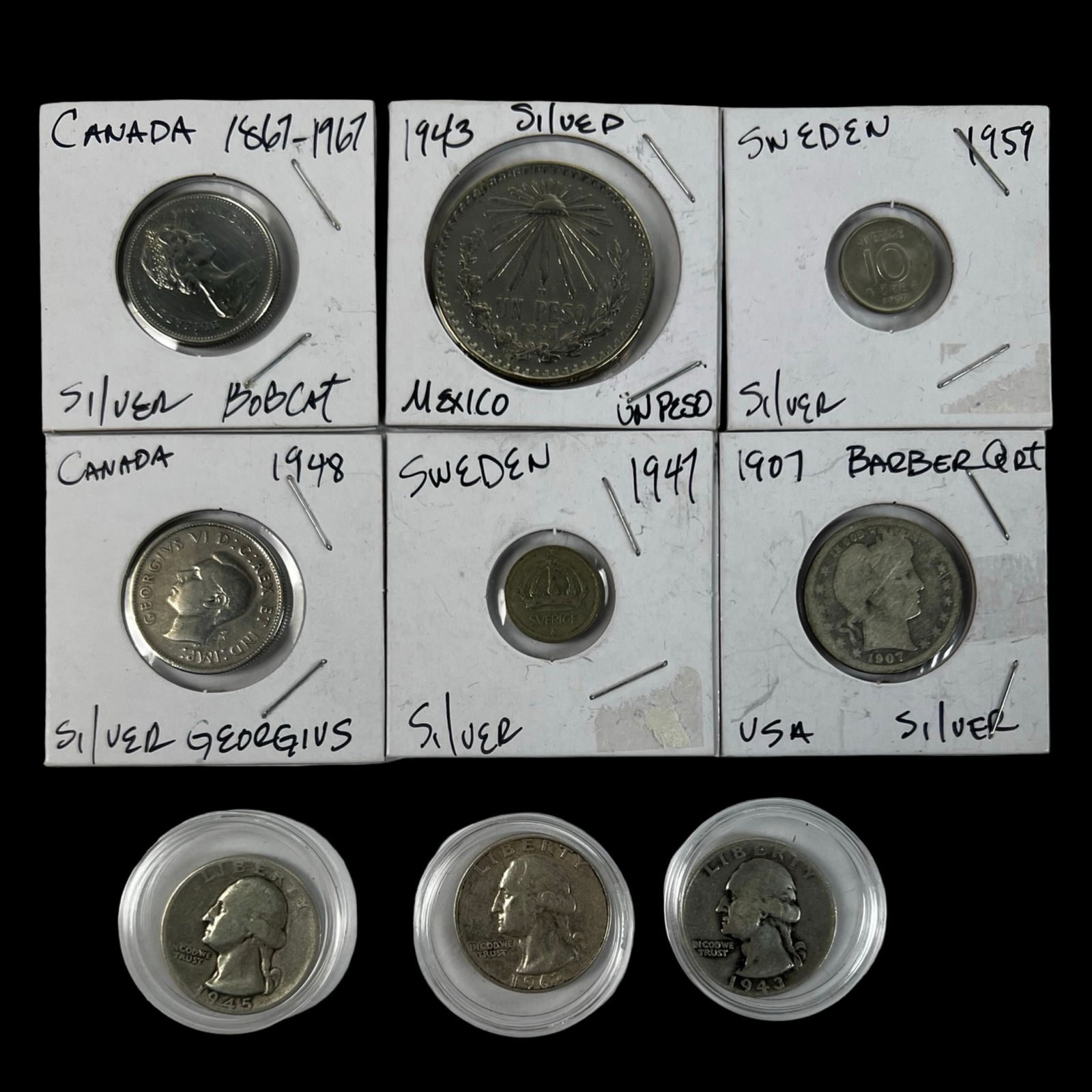 Vintage Silver Coins - US & World: Vintage silver coins from the United States, Canada, Mexico, and Sweden. Among the highlights are a 1967 Canadian Bobcat quarter commemorative and a 1948 Georgius VI silver coin. From Mexico, there is