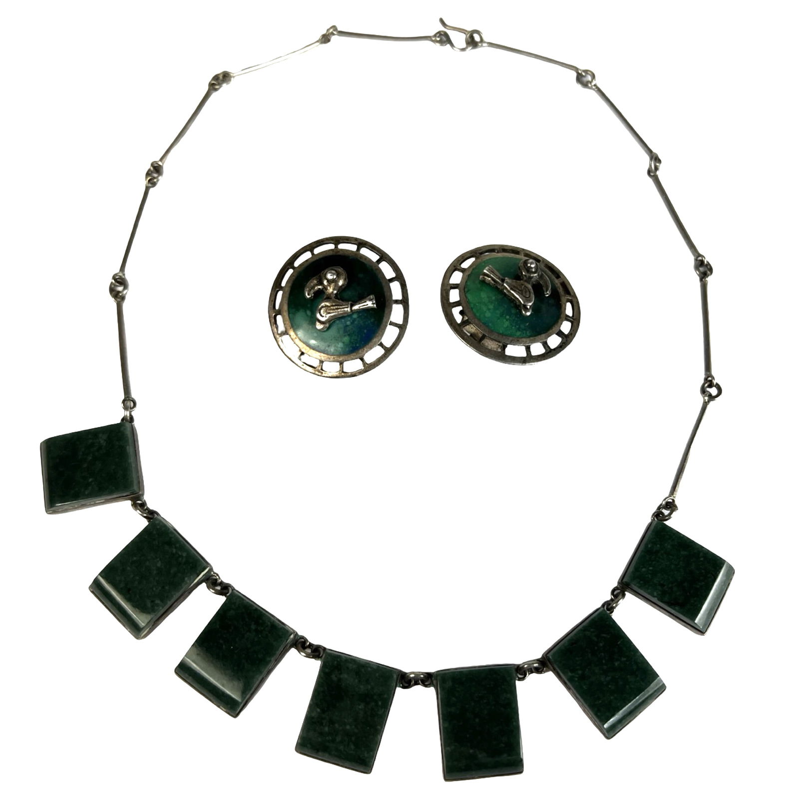 Sterling Silver Malachite Necklace & Earrings Set: Striking vintage set featuring a 17" sterling silver necklace with seven rectangular malachite panels in clean bezel settings, joined by slender bar links. Paired with round Peruvian clip-on earrings,