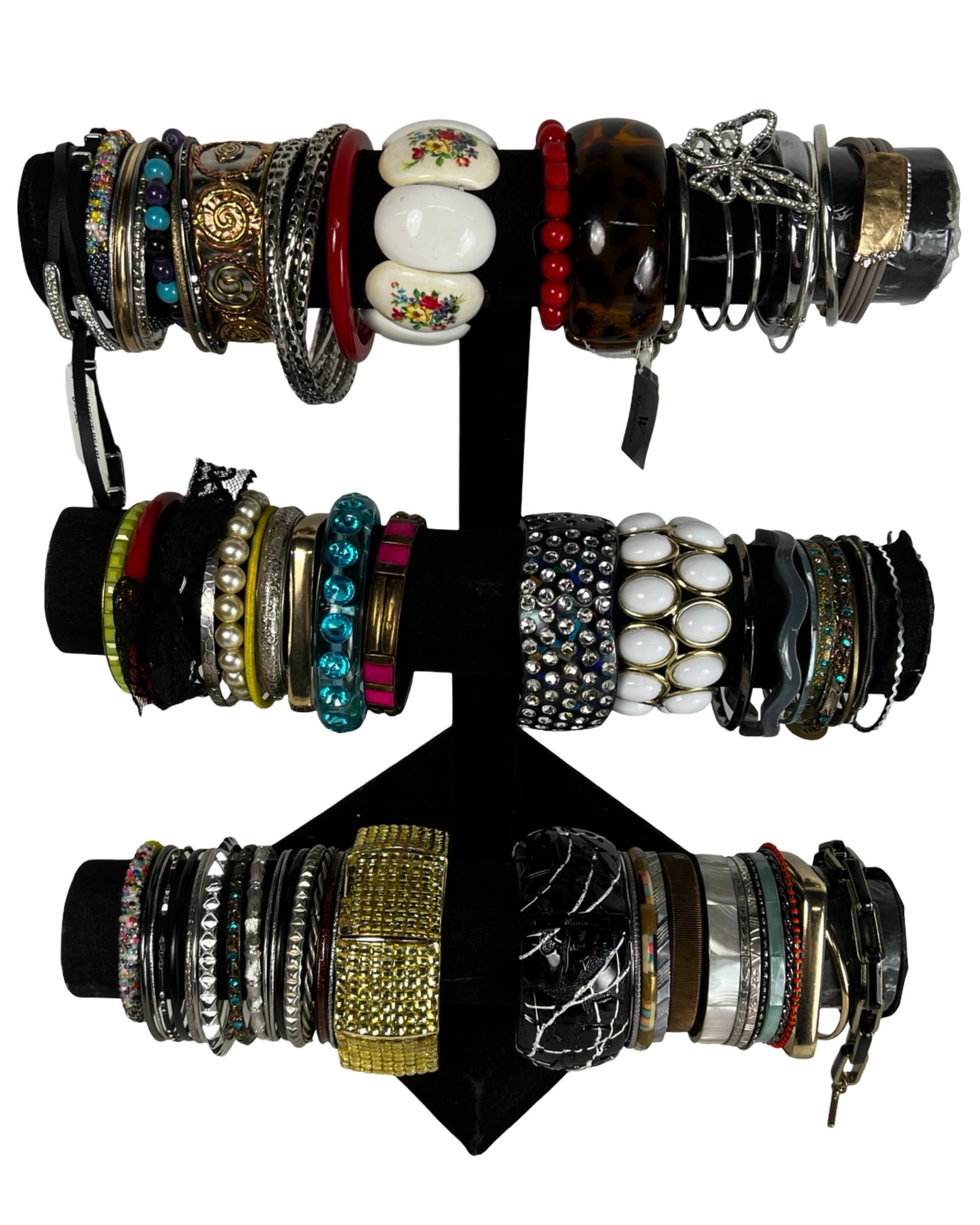 Collection of Lady's Bracelets: Explore a diverse assortment of bracelets, each one offering its own unique style and charm. Display stands are not included.