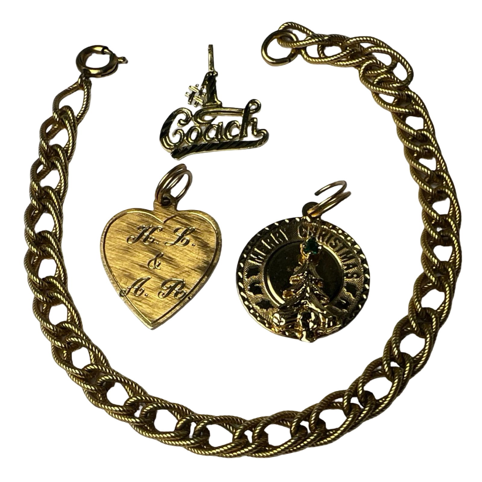 14k Gold Coach Pendant & Gold-Filled Jewelry: Vintage charm set featuring a 14k gold "#1 Coach" pendant marked "14K," accompanied by two 12k gold-filled engraved charms-one heart-shaped and one round with "Merry Christmas" and a raised Christmas