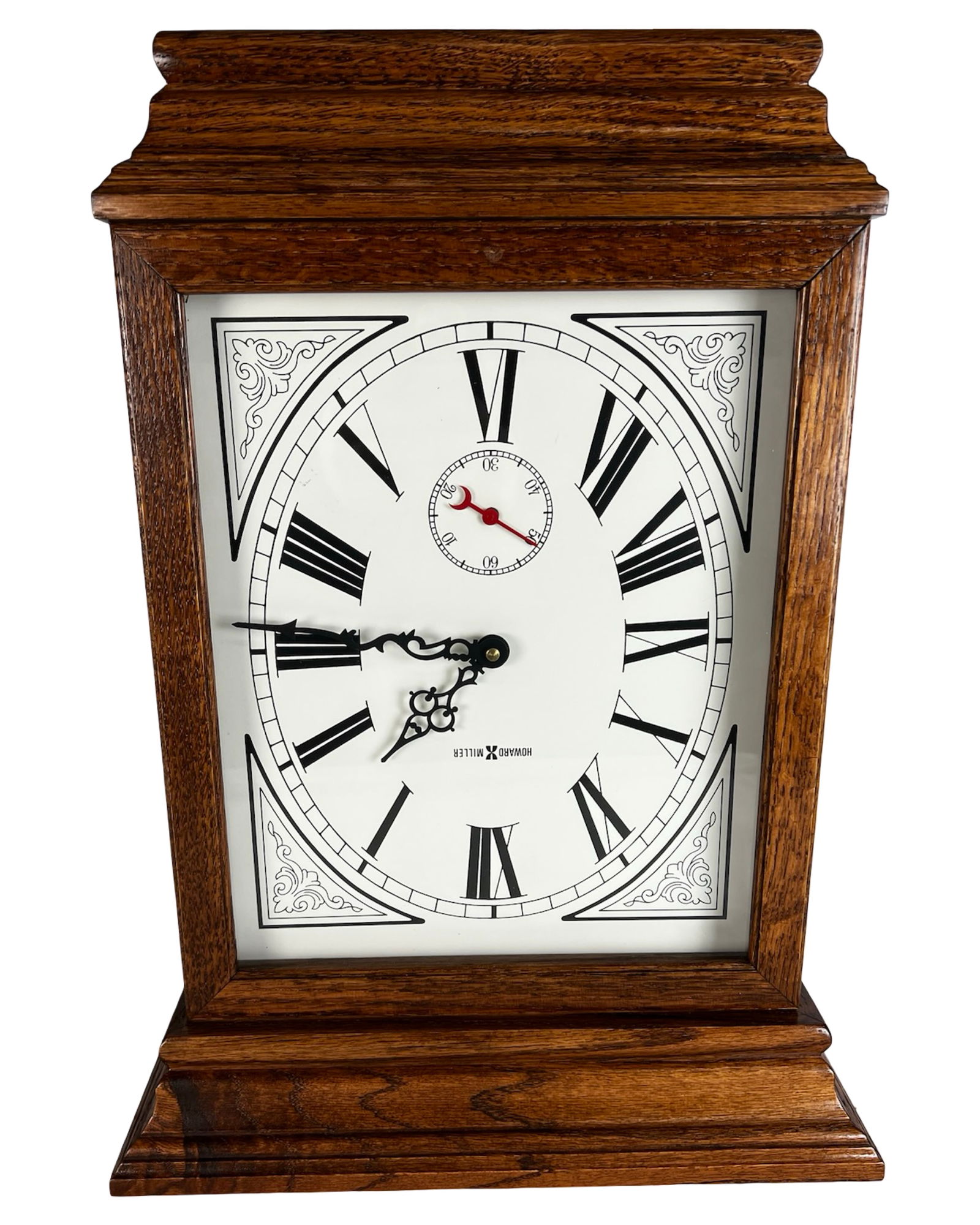 Howard Miller Fables Wall Clock: Howard Miller "Fables" wall clock, model 613-239, crafted from select hardwoods and veneers with an Oak Yorkshire finish. The clock features a classic rectangular case with molded top, Roman numeral d