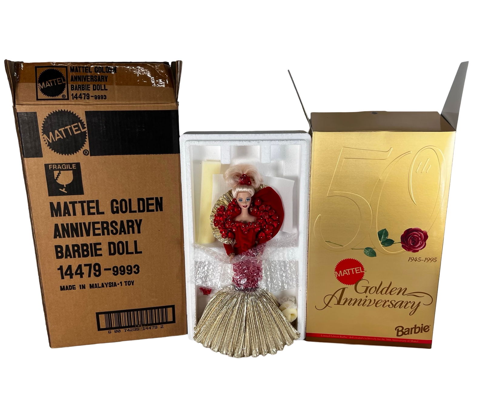 Barbie 50th Golden Anniversary Doll: Barbie Golden Anniversary Doll by Mattel, stock #14479, released to commemorate the brand's 50th anniversary (1945-1995). This limited edition doll features an elaborate red and gold gown with rose de