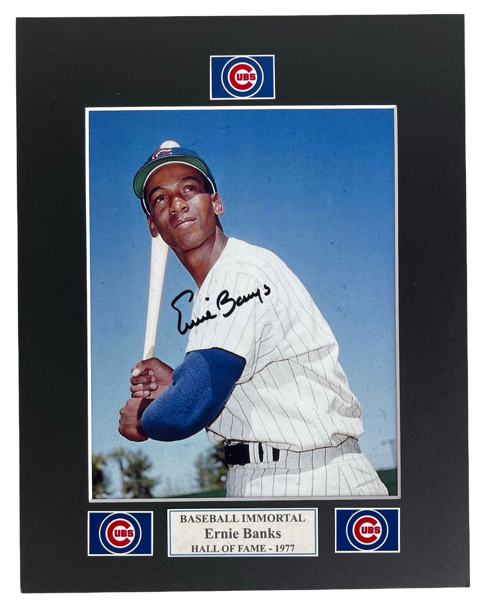 Ernie Banks Autographed Hall of Fame Photograph: Iconic signed photo of legendary Chicago Cubs slugger Ernie Banks, affectionately known as "Mr. Cub." Captured in a classic batting pose and hand-signed in bold marker, this vintage image is presented