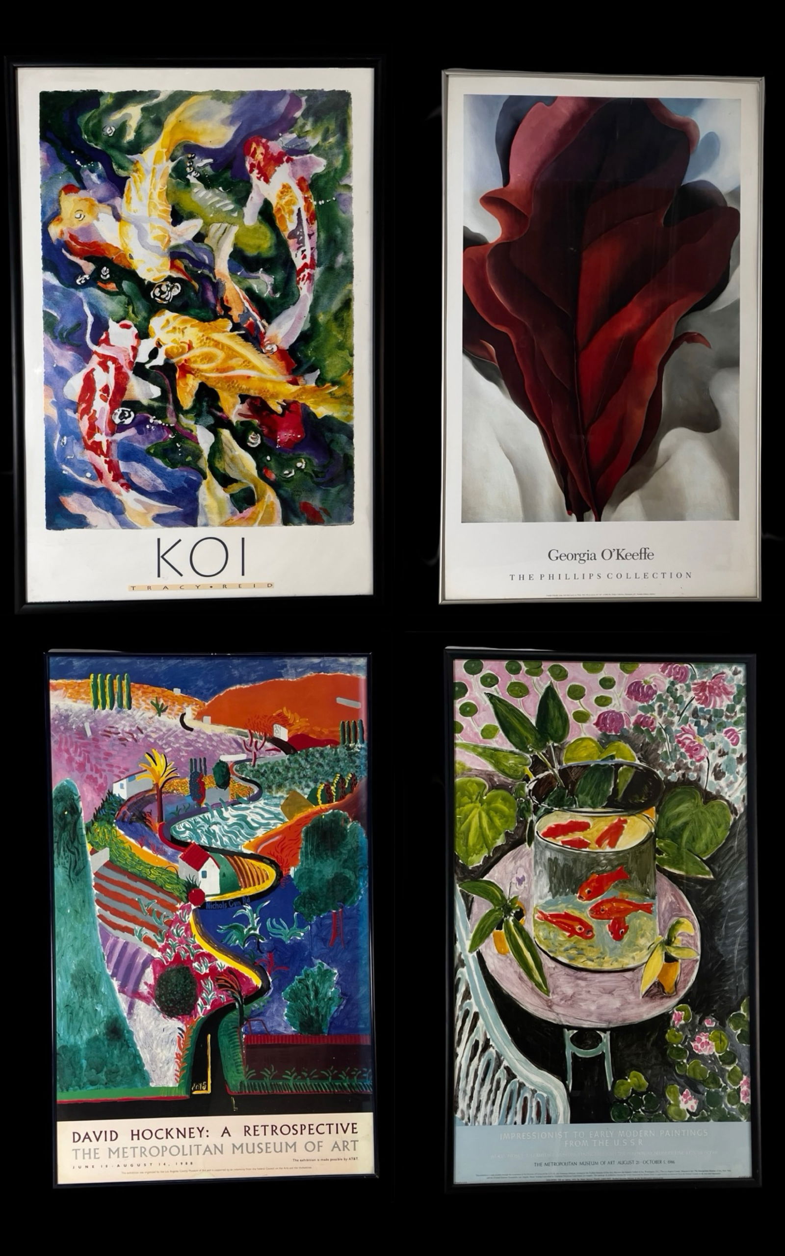 Art Posters: Reid, O'Keeffe, Hockney & USSR Exhib: Collection of four large framed art posters including "Koi" by Tracy Reid, a bold floral by Georgia O'Keeffe (The Phillips Collection), David Hockney's "A Retrospective" (1988 Metropolitan Museum of A
