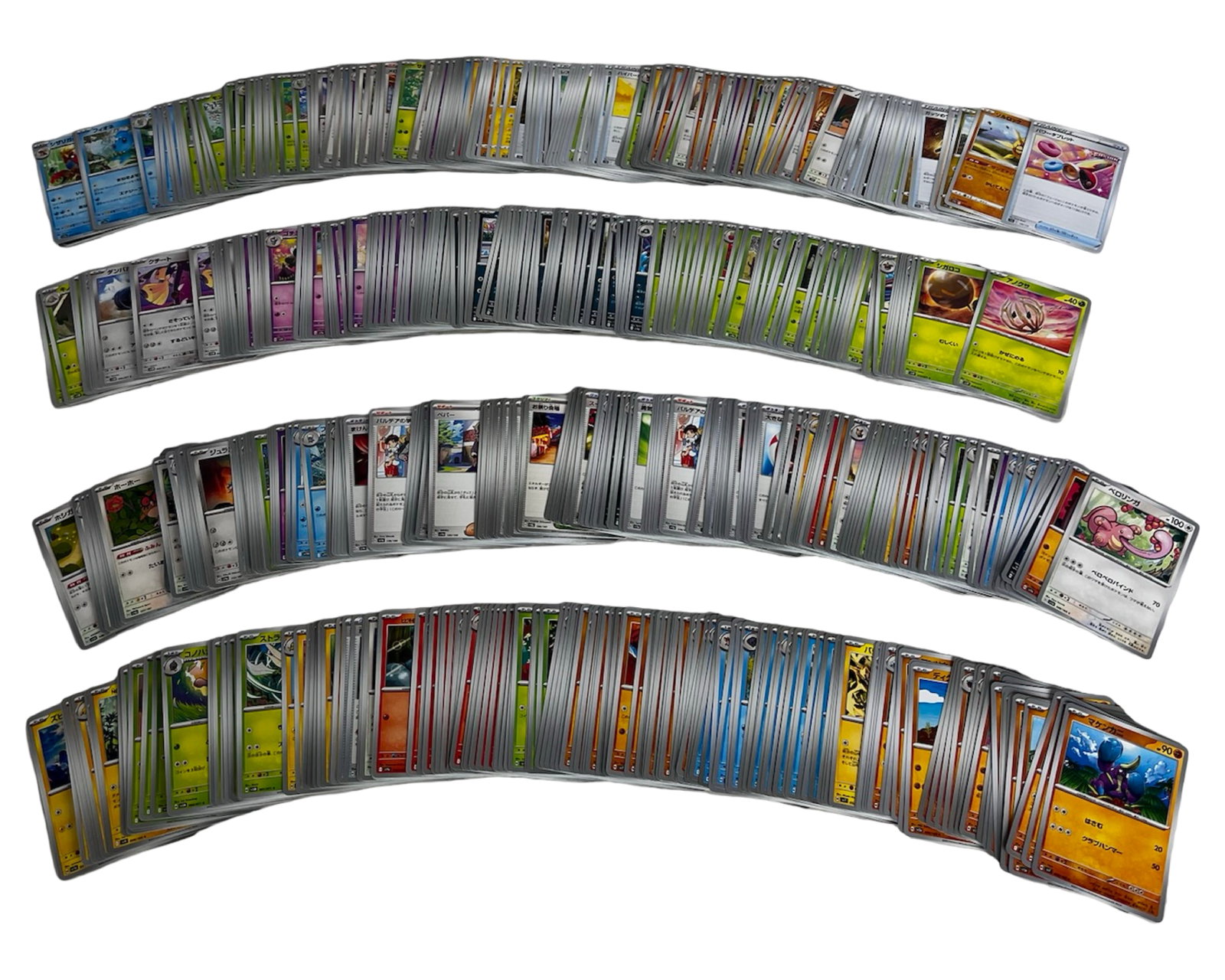 Large Lot of Japanese Pokemon Trading Cards: Large mixed lot of Japanese Pokemon trading cards featuring a wide variety of Pokemon, Trainer, Energy, and Item cards from multiple Japanese releases.