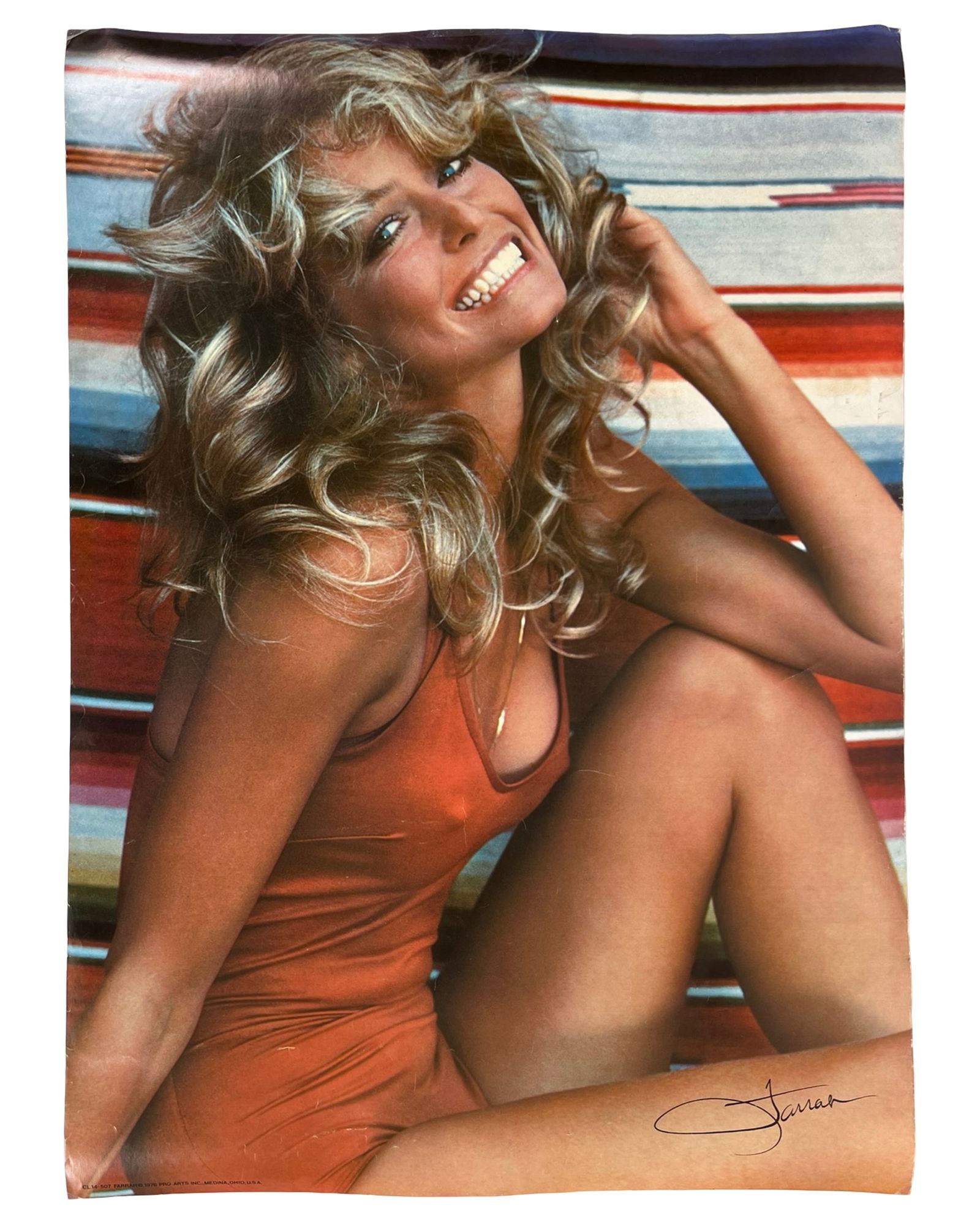Farrah Fawcett - Iconic 1976 Swimsuit Poster: Original 1976 poster featuring Farrah Fawcett in her iconic red swimsuit pose that became one of the most famous pin-up images of all time. This image, taken by photographer Bruce McBroom for Pro Arts