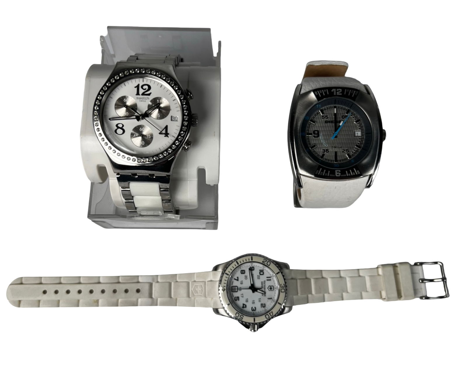 Swatch Secret Thought Chronograph, Diesel & Victor: Swatch Secret Thought White Chronograph Watch, Diesel DZ1158 Watch and Victorinox Swiss Army Maverick GS Watch. Swatch is in mint condition with box, Diesel and Victorinox are in good overall conditio