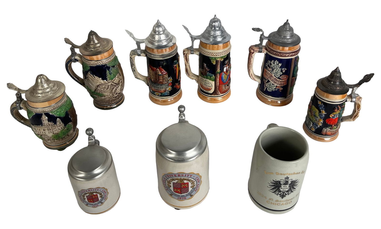 Vintage Beerr Steins and Mugs with Pewter Lids: Assorted lot of vintage beer steins and mugs, primarily made in Germany and Western Germany, many with hand-painted relief scenes and traditional motifs. The grouping features a mix of figural tavern