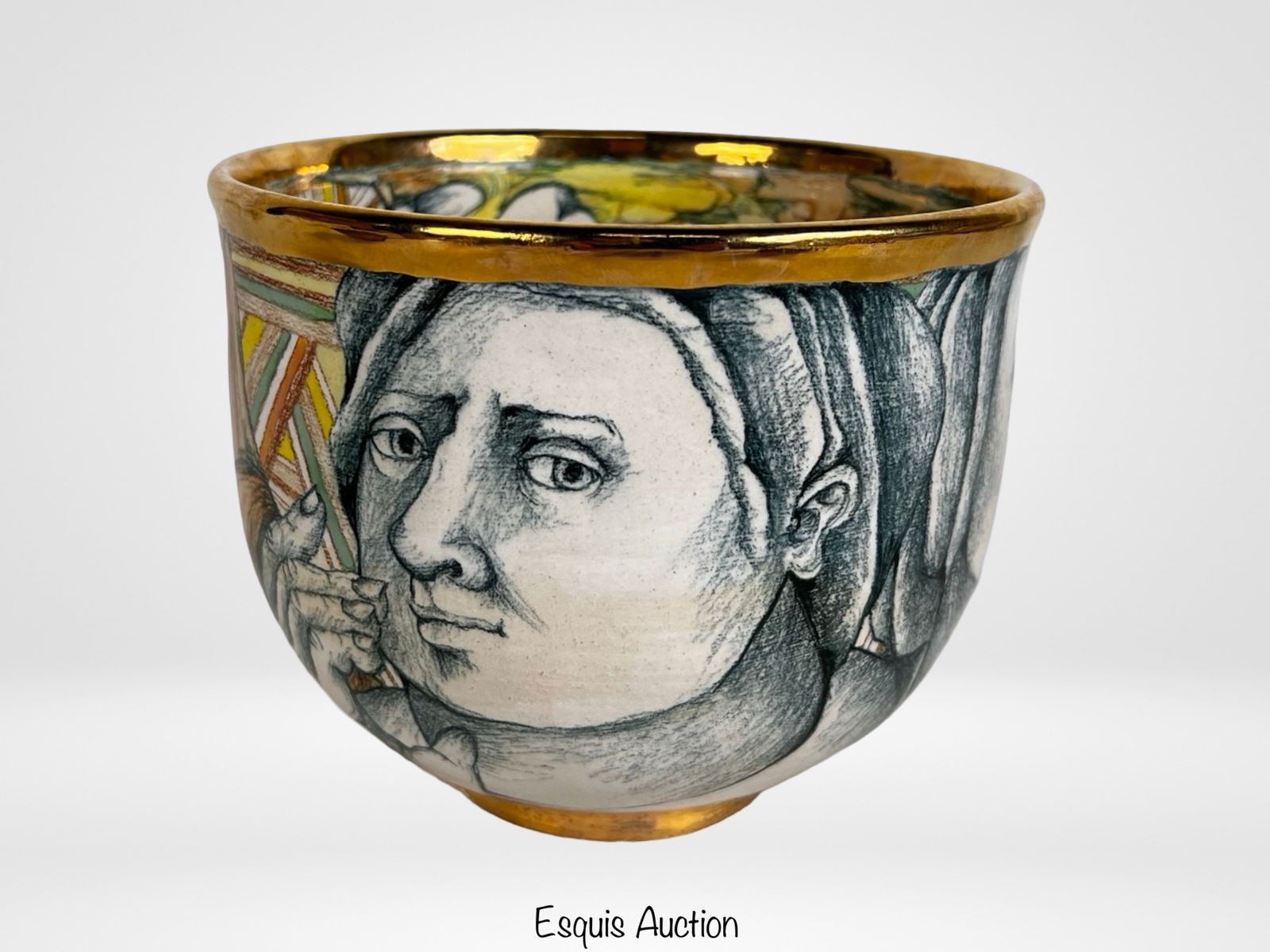 Mary Lou Higgins Hand-Decorated Ceramic Bowl: Striking hand-crafted ceramic bowl by American artist Mary Lou Higgins, dated 1988. This expressive work features finely drawn and vividly painted human faces circling the exterior, rendered in detail
