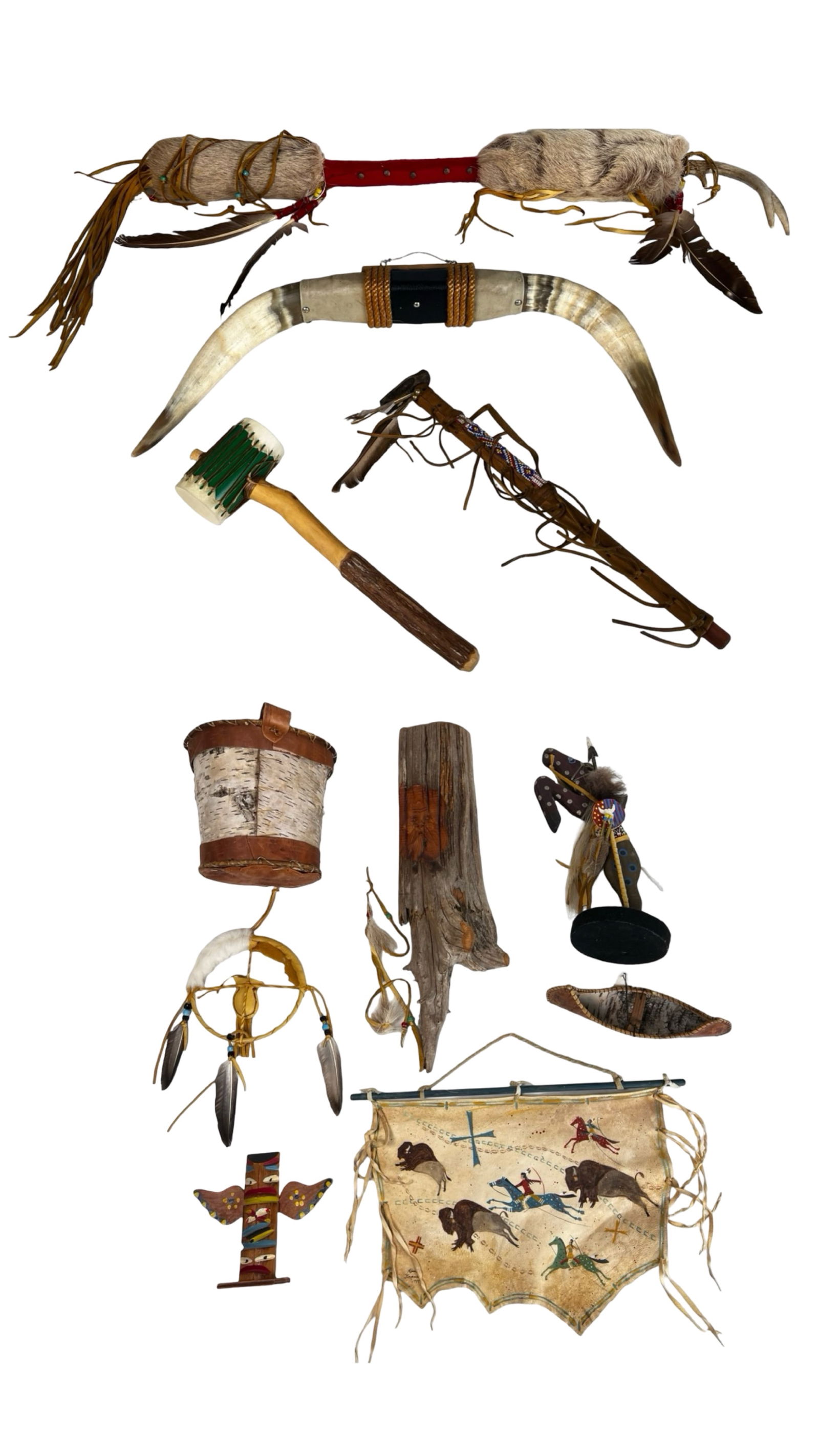 Native American Decorative Objects & Wall Decor: Eclectic Native American-style decorative collection featuring a variety of wall and display pieces, including horn décor, fur- and feather-adorned ceremonial-style objects, a Kokopelli figure, a bir