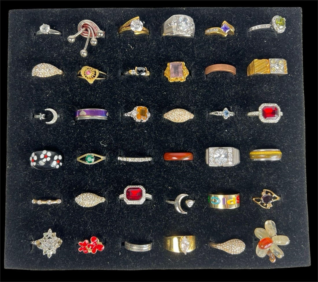 Exquisite Collection: Set of 36 Various Rings: Embark on a journey through diverse styles and eras with this stunning collection of 36 rings, each possessing its own unique charm and character. From timeless classics to contemporary statement piec