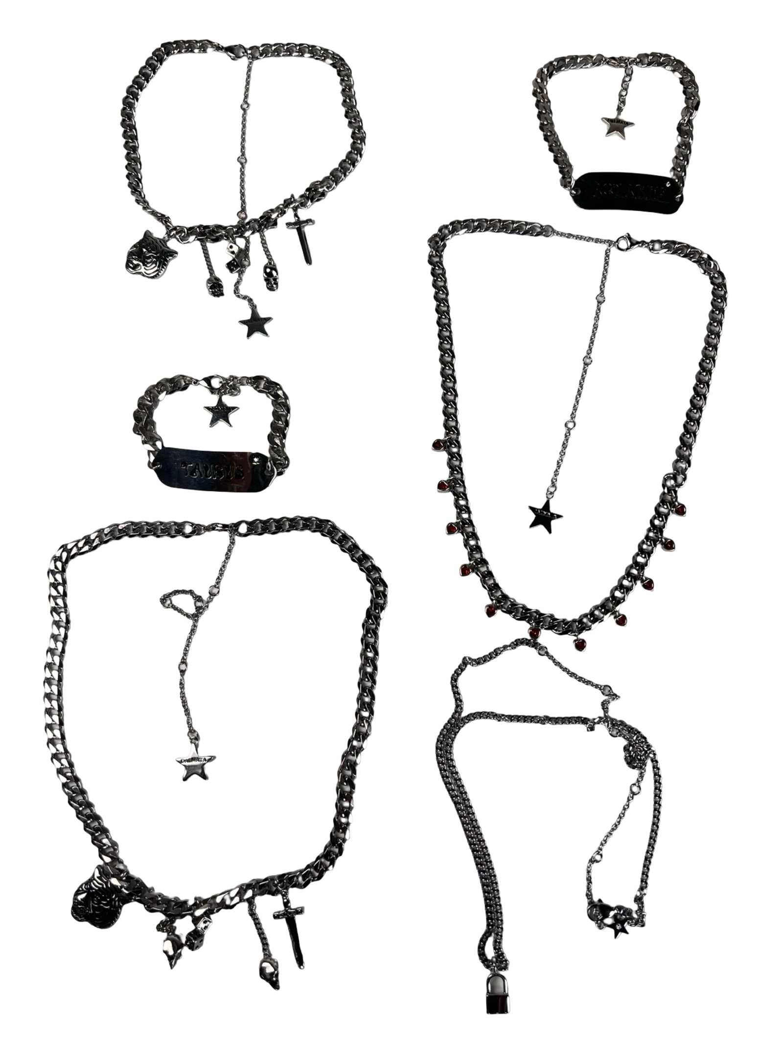 Dalmata Designer Jewelry- Billie Eilish Style: Collection of edgy contemporary stainless steel jewelry by Dalmata, known for its bold, streetwear-inspired aesthetic popularized by celebrities like Billie Eilish. The lot includes several chunky cha