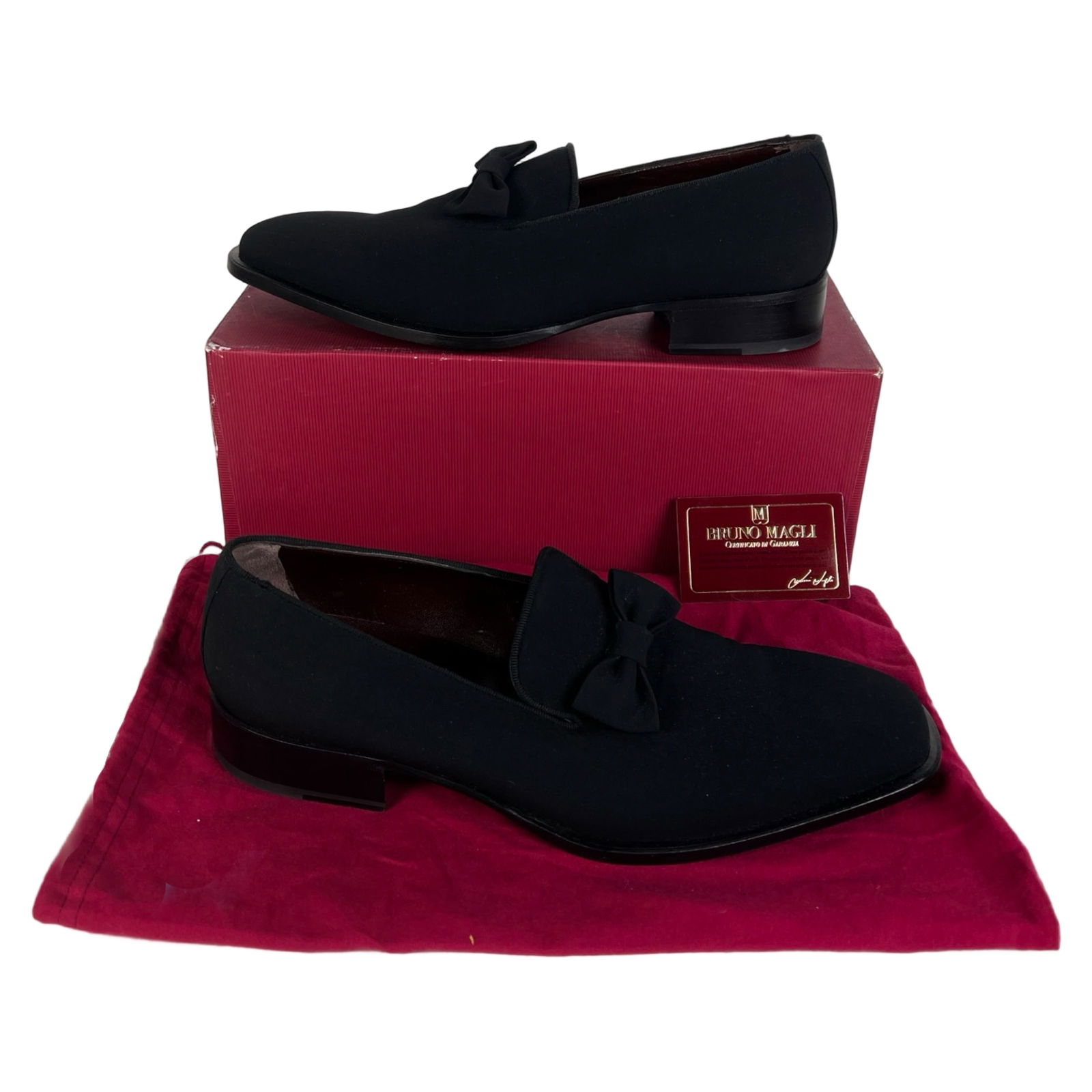 Bruno Magli Black Formal Loafers- Men's Size 9: Sophisticated and timeless, these Bruno Magli men's loafers feature a black textile upper with a sleek silhouette and an elegant bow detail across the vamp. Ideal for black-tie events or upscale occas