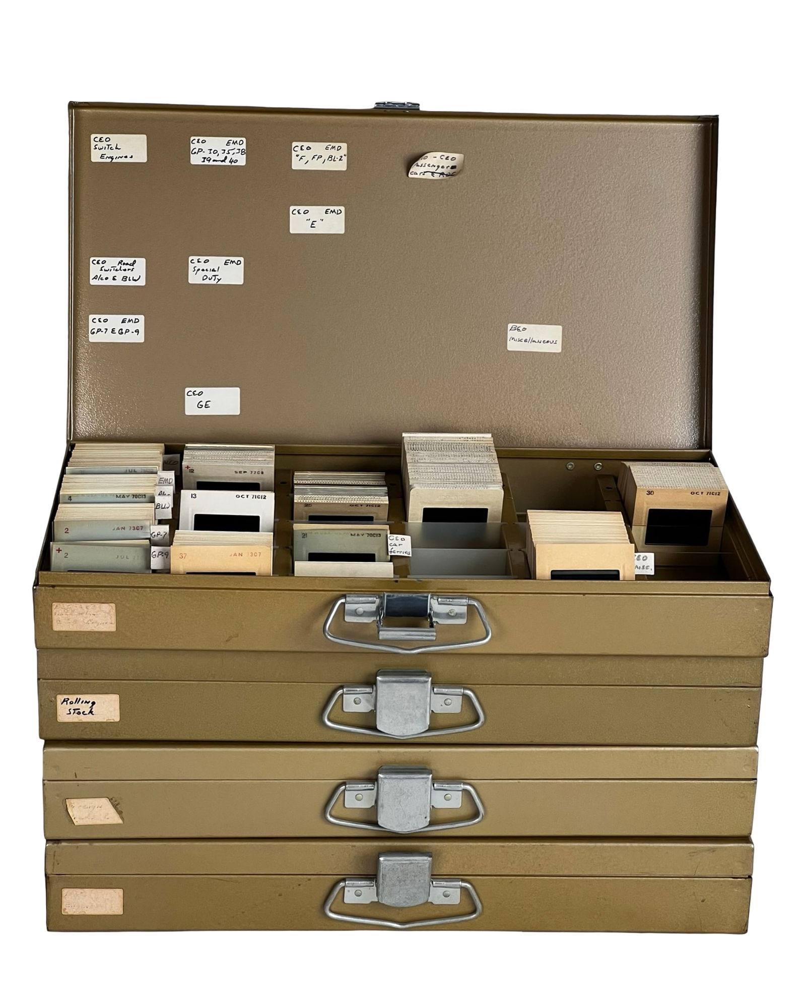 Group of Vintage Railroad Train Projector Slides: Extensive collection of vintage 35mm railroad-themed projector slides housed in multiple metal storage cases. The group features a wide range of diesel locomotives, freight cars, rail yards, depots,